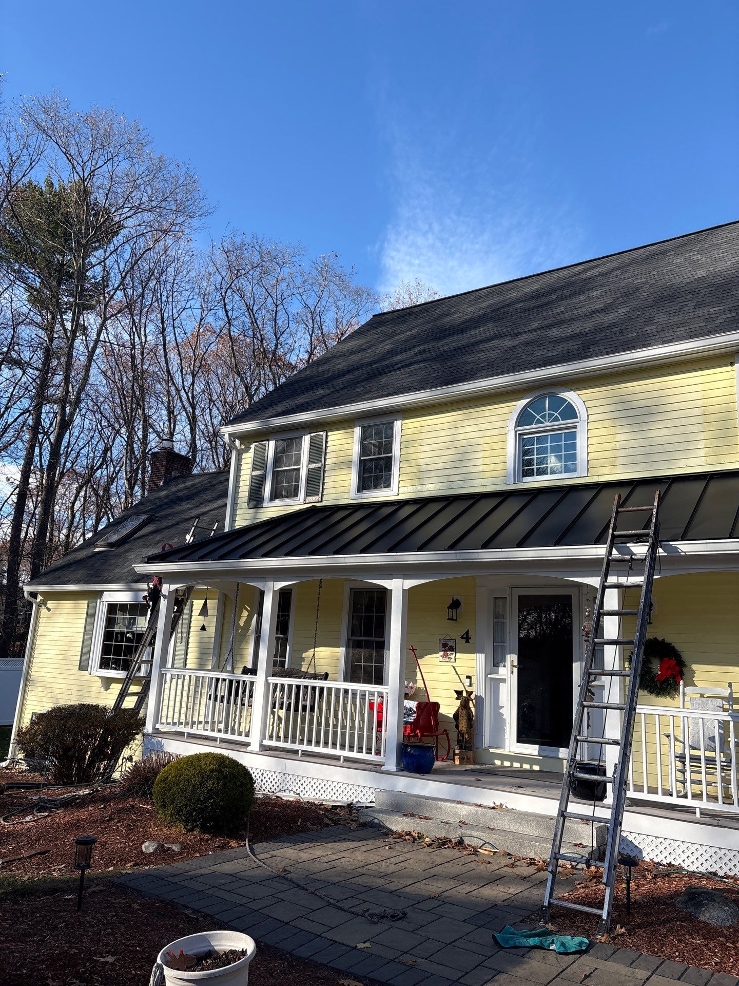 Chelmsford Premium Roof: Onyx Black Shingles with Standing Seam Metal Porch by Mighty Dog Roofing of Greater Middlesex County