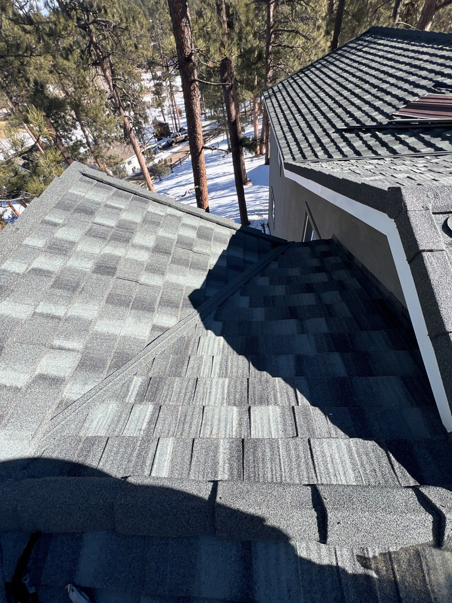 Residential Roofing Installation using Stone Coated Steel by Blue Peaks Roofing LLC 