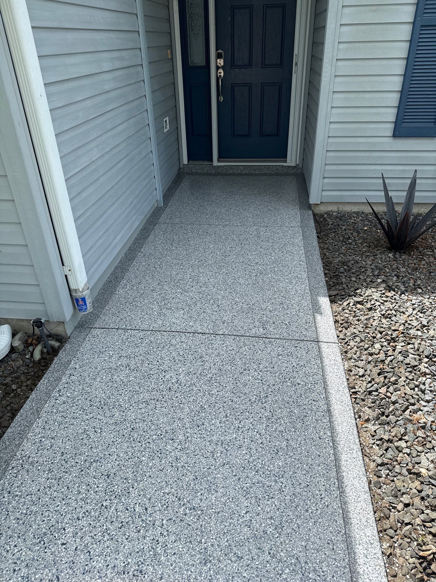 Driveway Tidal Wave with Cool Breeze Border and Sidewalk by Innovative Concrete Coatings 