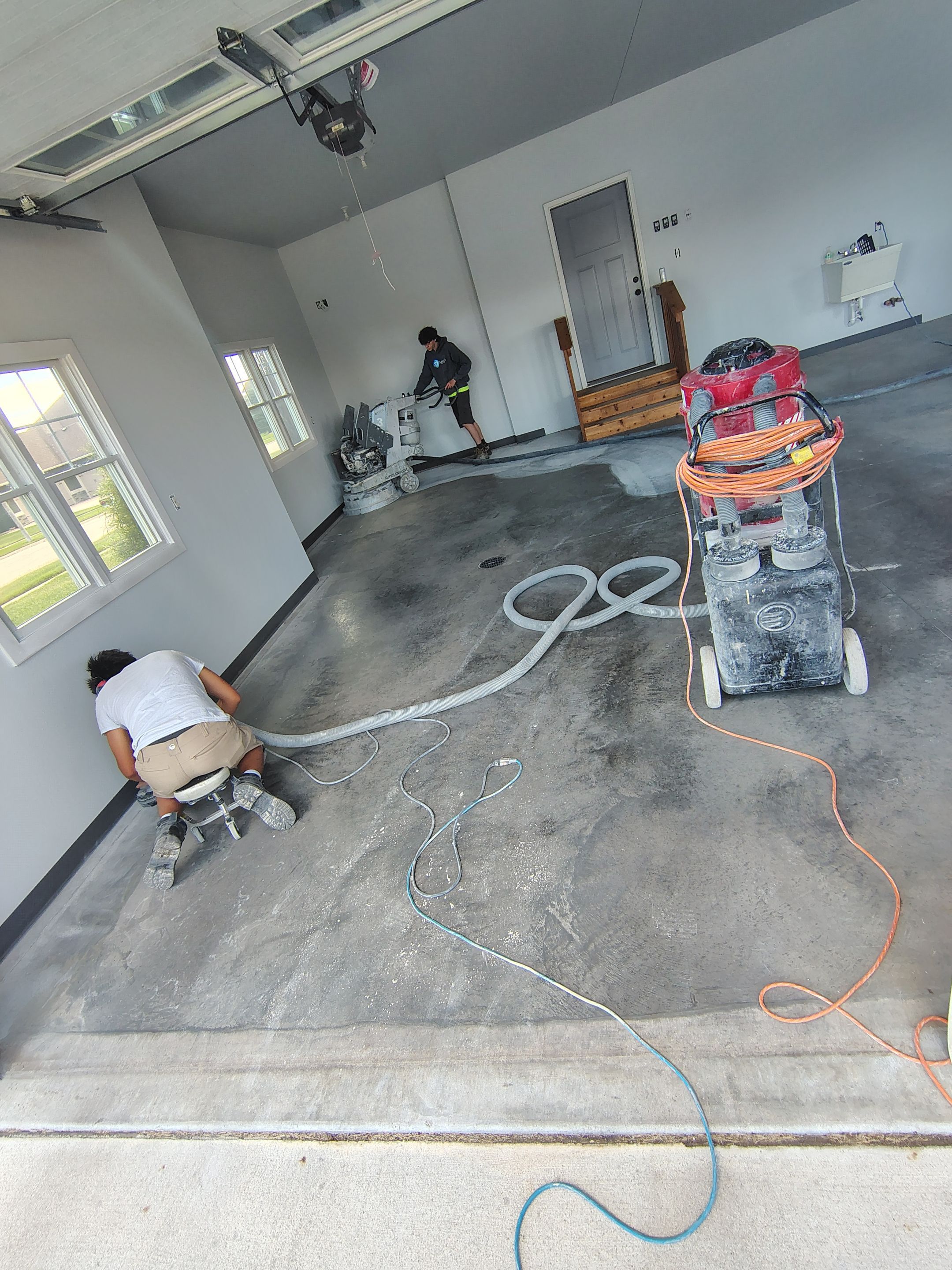 Multi-Car Garage Concrete Coating and Crack Repair in Dell Rapids by Select Painting, Coatings & Garage Cabinets