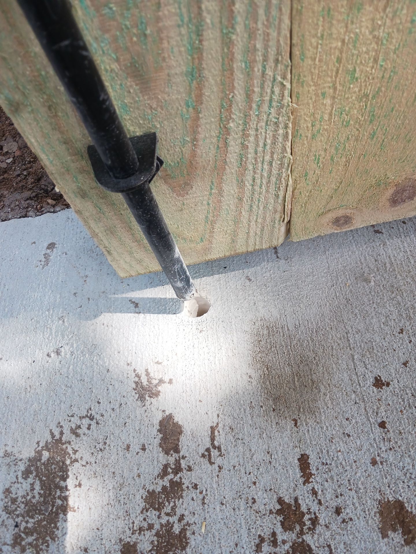Concrete Driveway and Fence by Clays Services Inc