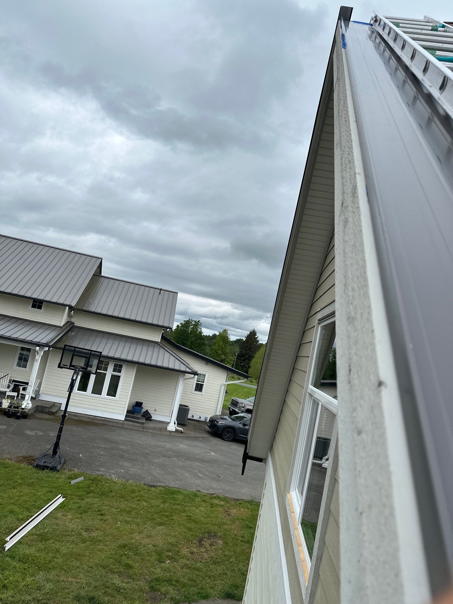 Residential Roofing Installation using 12" Prolok metal  by Top Notch Roofing Inc