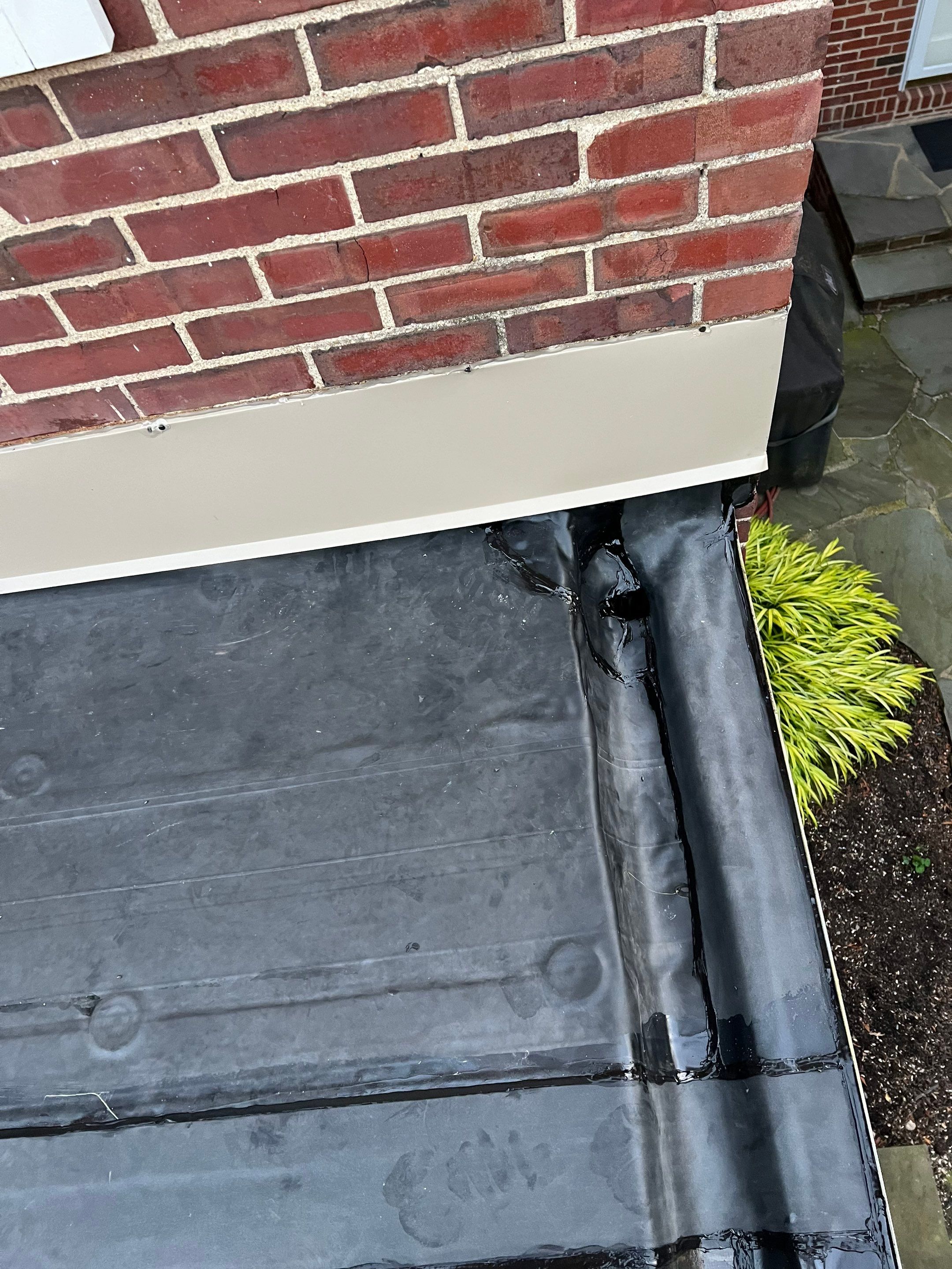 Residential Roofing Installation using 60 mil rubber roof  by Nitro Roofing and Construction