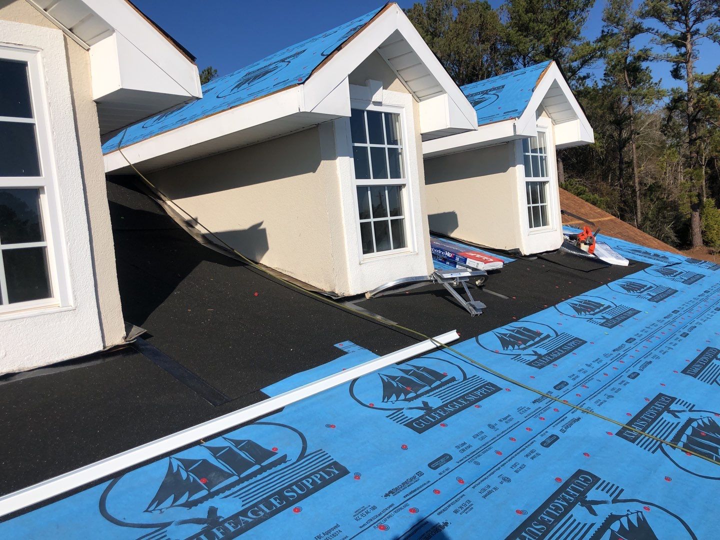 Residential Roofing Installation using Roof Replacement by American Roofing & Construction LLC