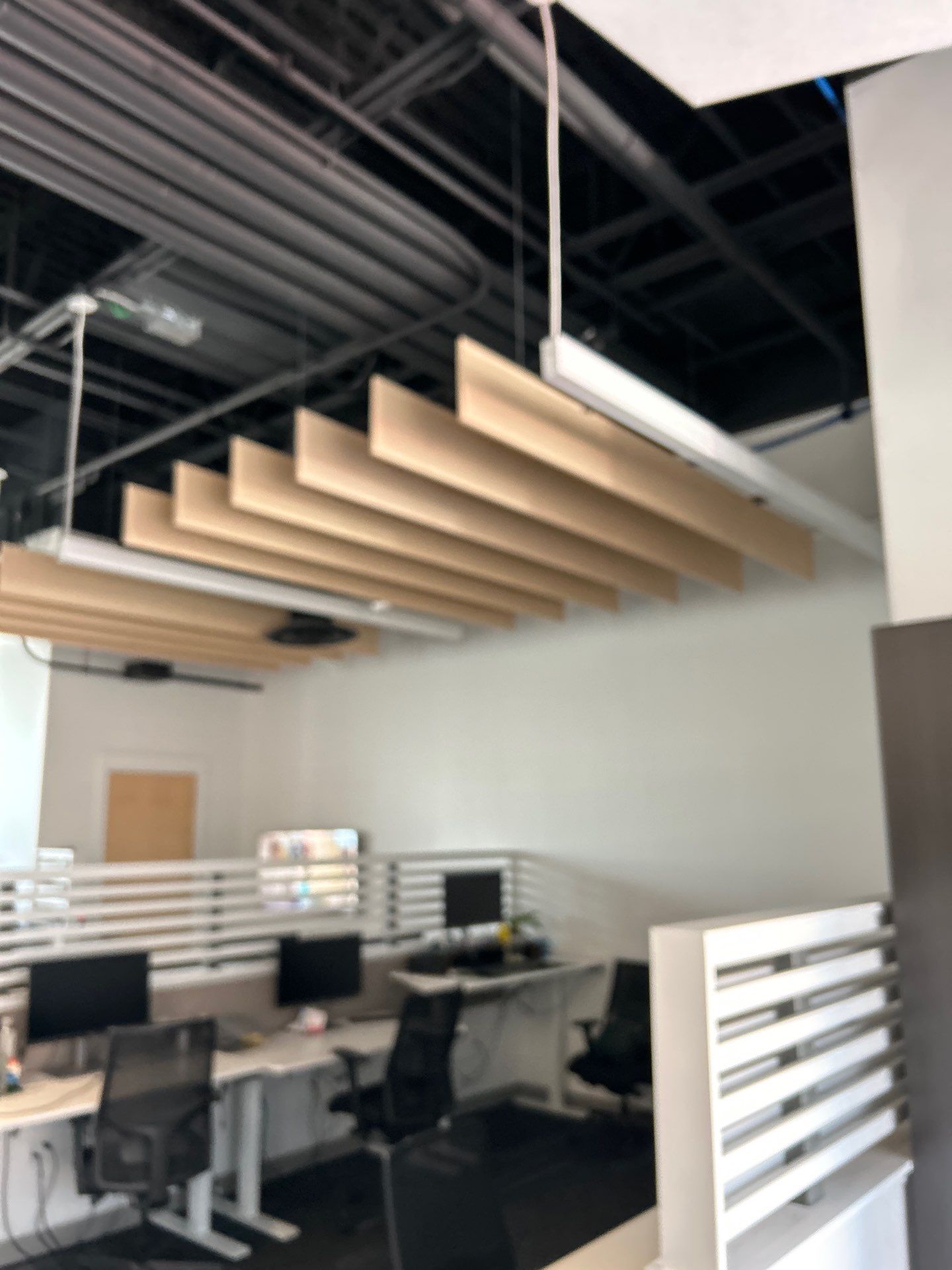 Office Remodel Featuring Acoustic Baffles and Professional Carpet Installation by CompanyCam Sales Demo