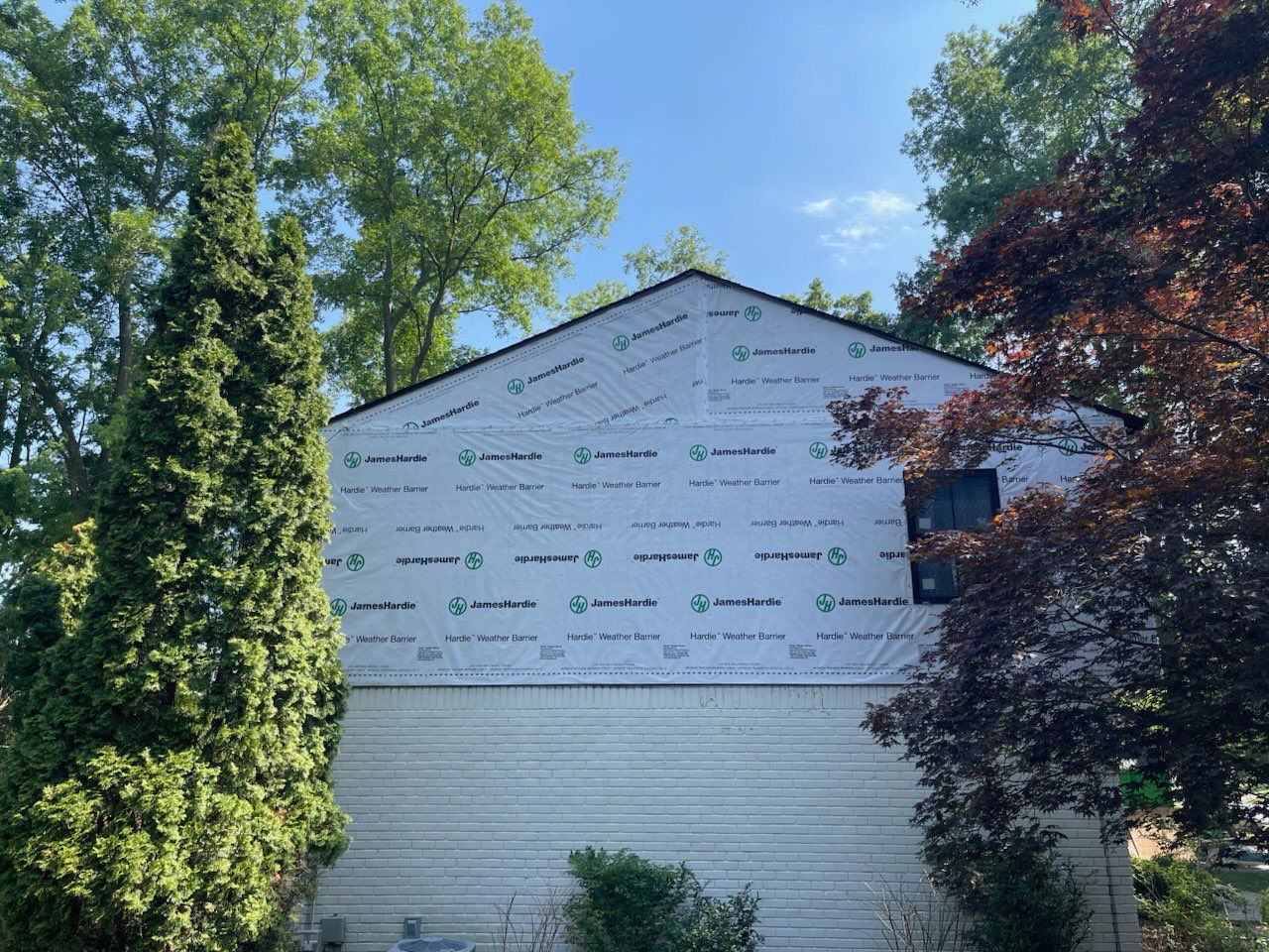 Siding Replacement using Hardie Plank S8 1/4"  Arctic White by 180 Contractors