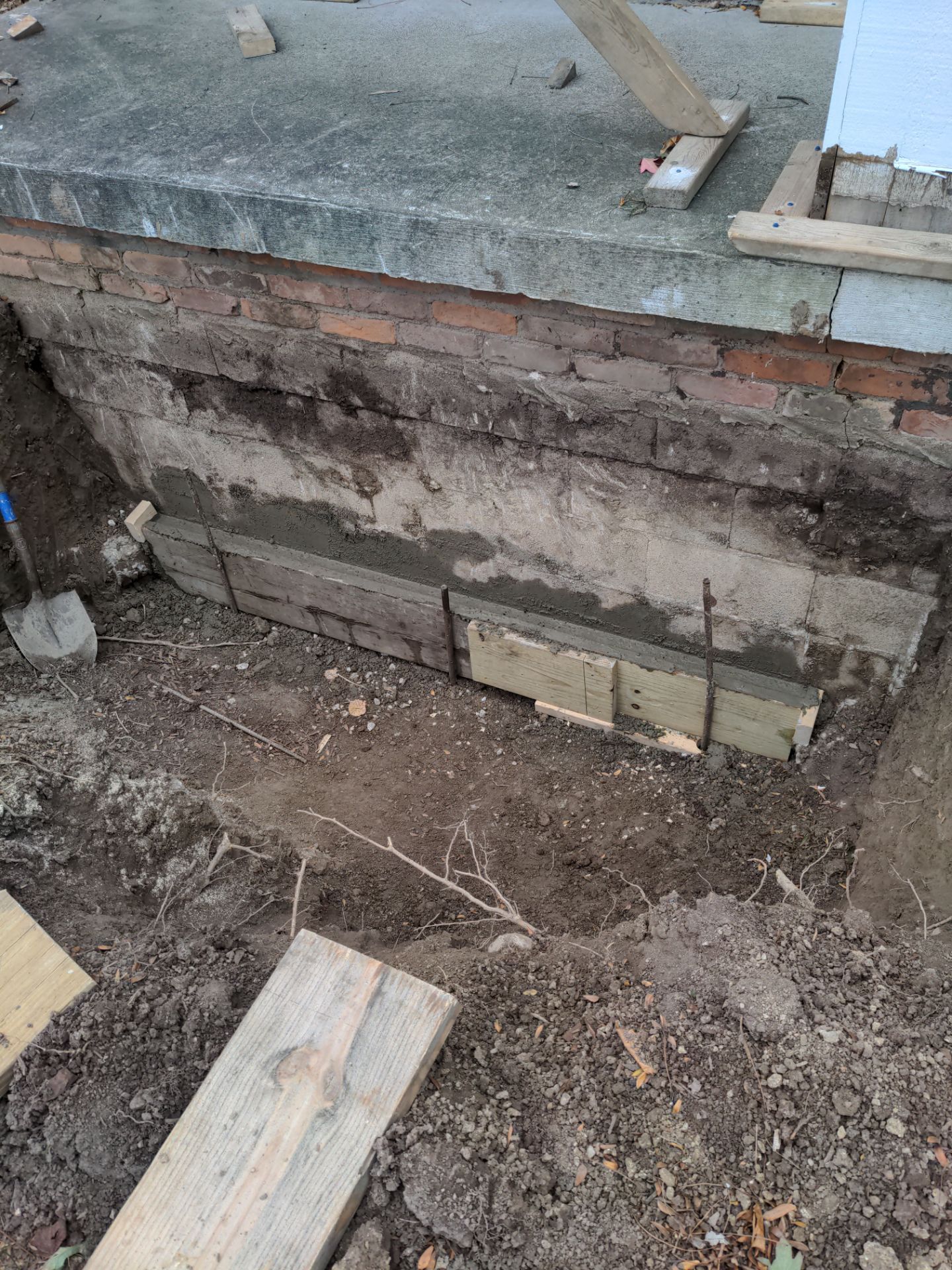 Helical Piers and Pillar Lift using Helical Foundation Footings by Toledo Basement Repair