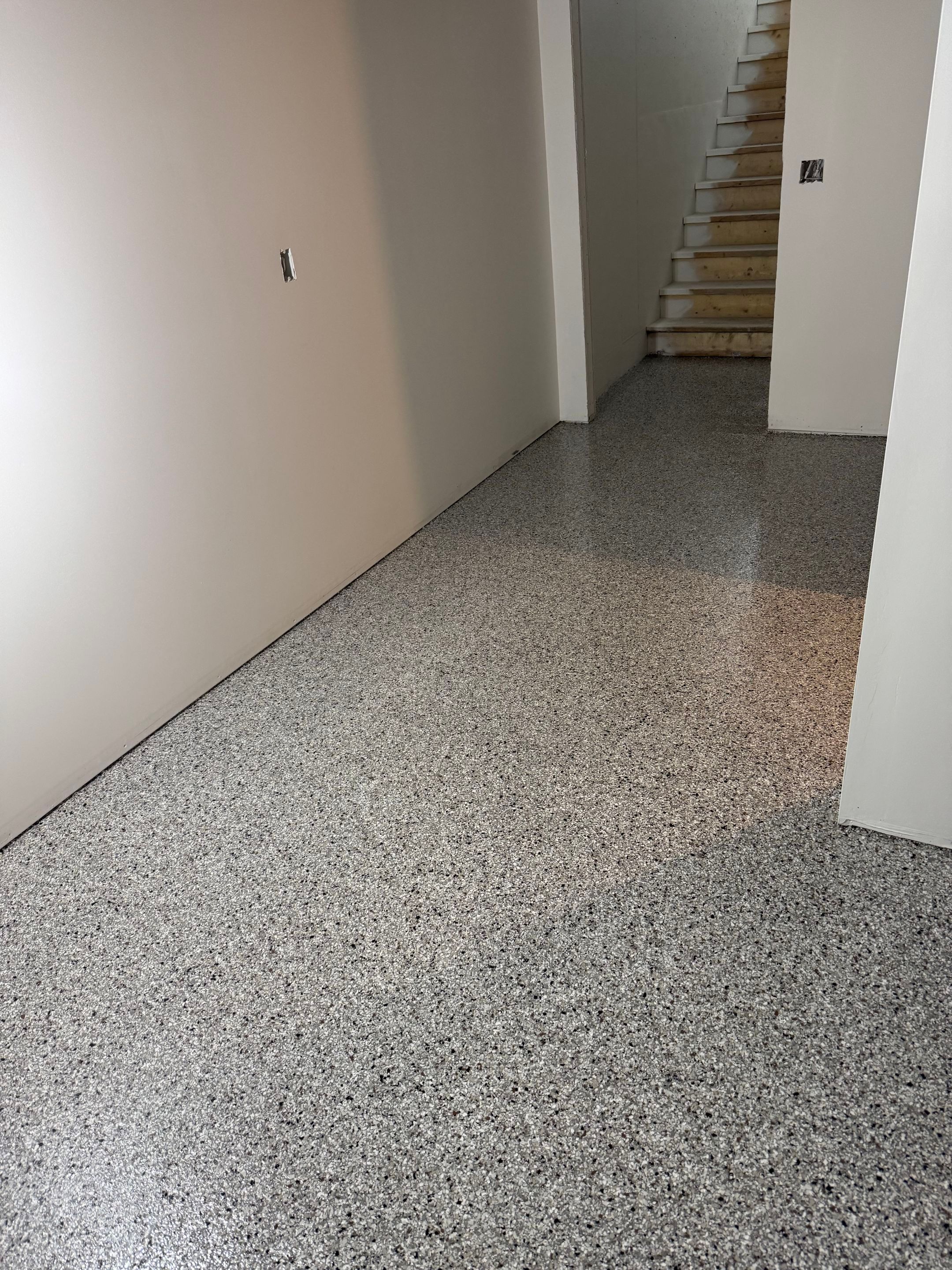 Custom Garage and Basement Epoxy Floor Coating in Menno by Select Painting, Coatings & Garage Cabinets