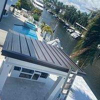 .032 Aluminum 1.5" Mechanical Seam Dark Bronze  by Total Roofing System The Metal Roof Experts