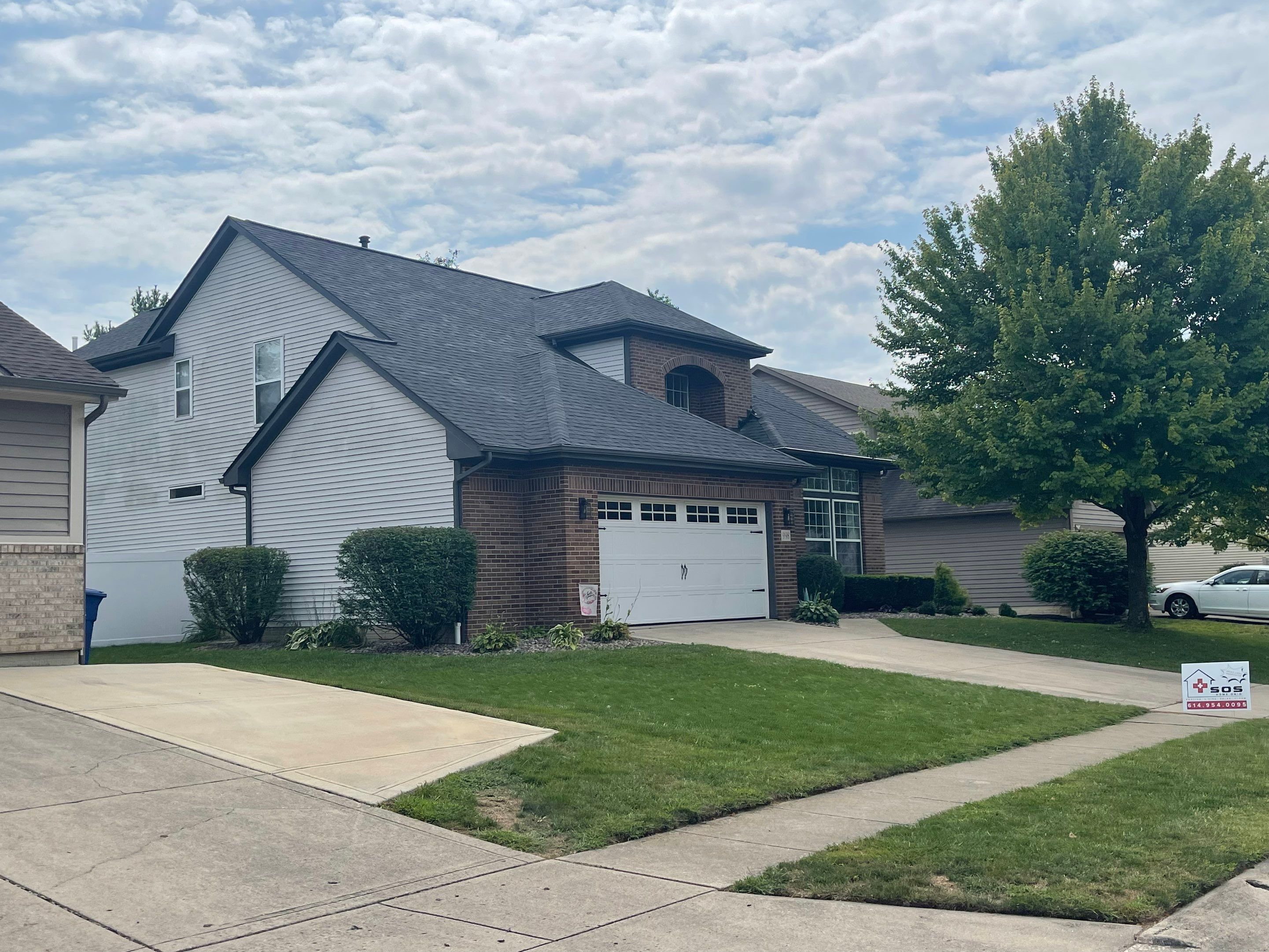 Full replacement - insurance paid. Big brick flashing work by SOS Home Ohio 