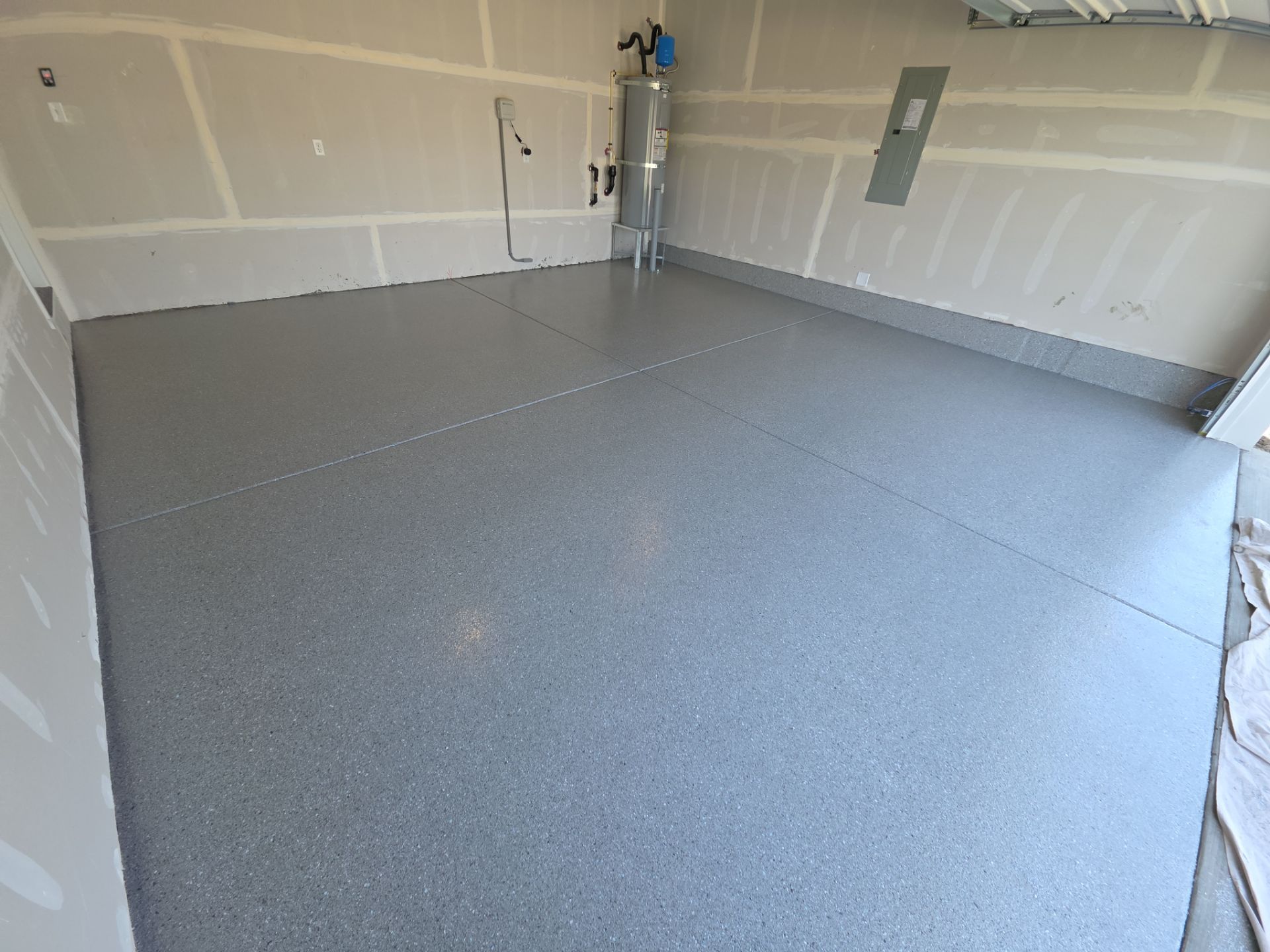 Garage Transformation using Battleship Hybrid by Croc Coatings, LLC