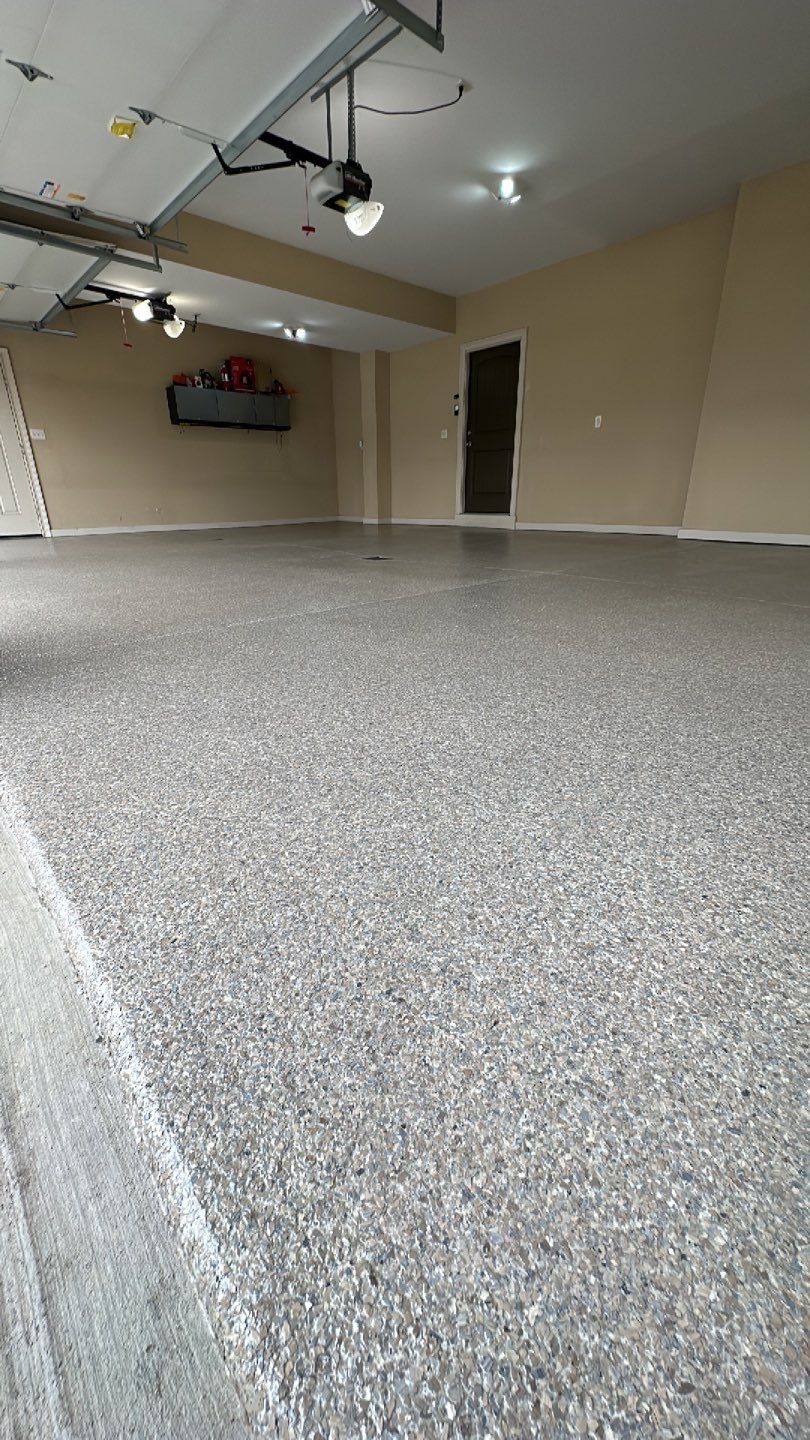 Large Patio + Garage Project in Moon Township by Floors in a Day, Inc