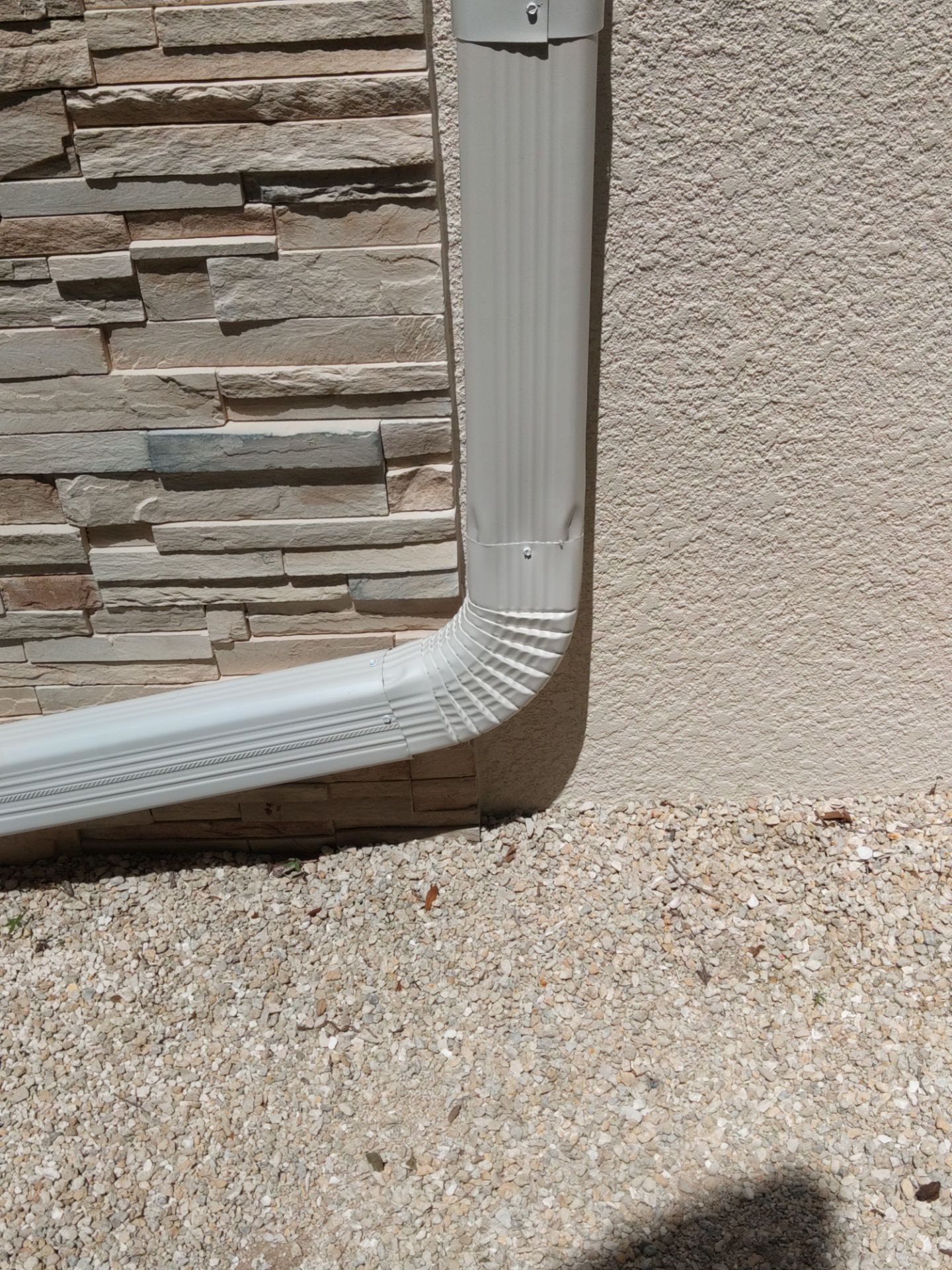 Bronze Gutters and Almond Downspouts in Longboat Key FL by Gutter Professors