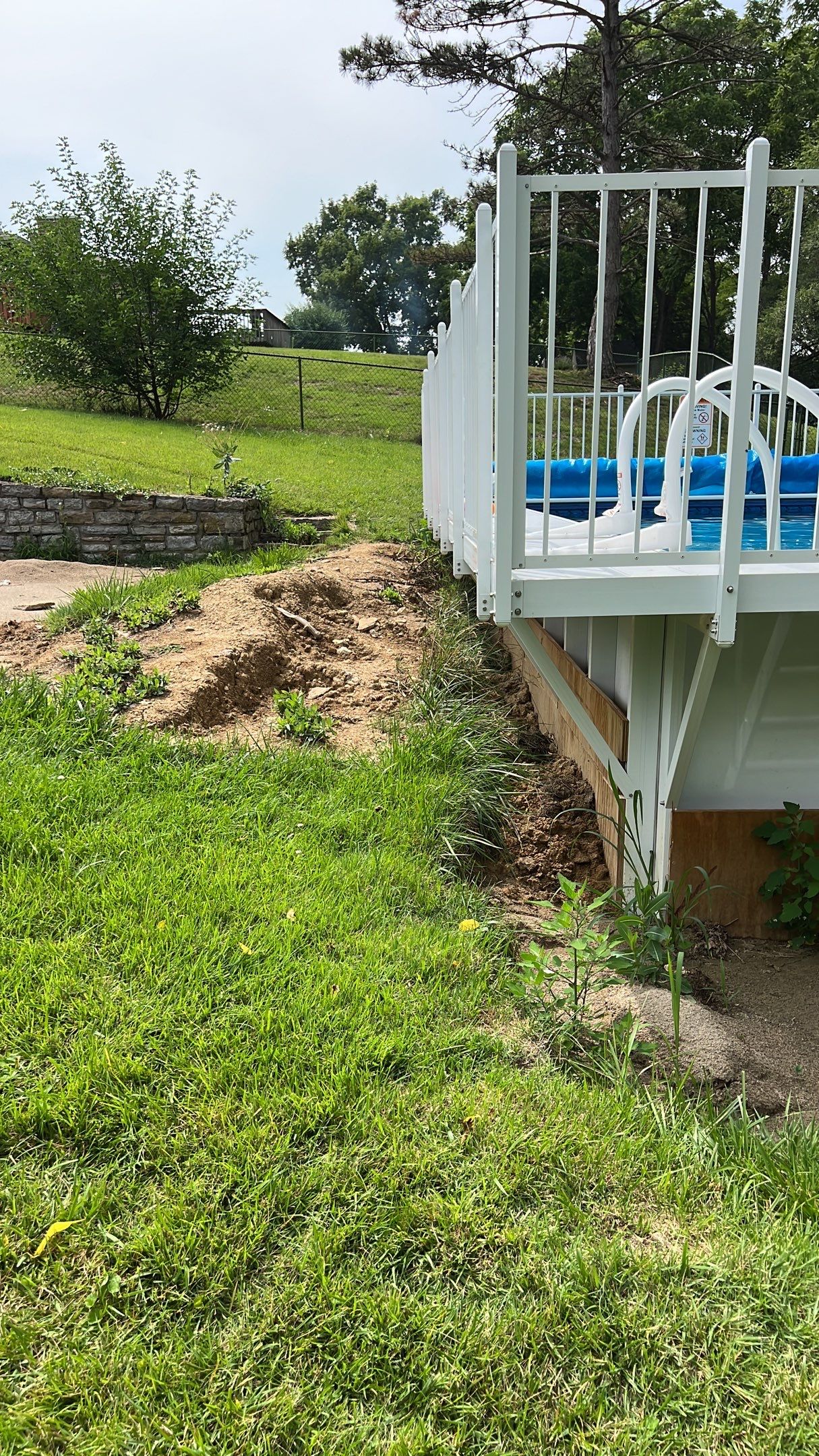 Pool Backfill, Grading, and Decorative Gravel Installation by Reisenberg’s Lawn & Landscape, LLC