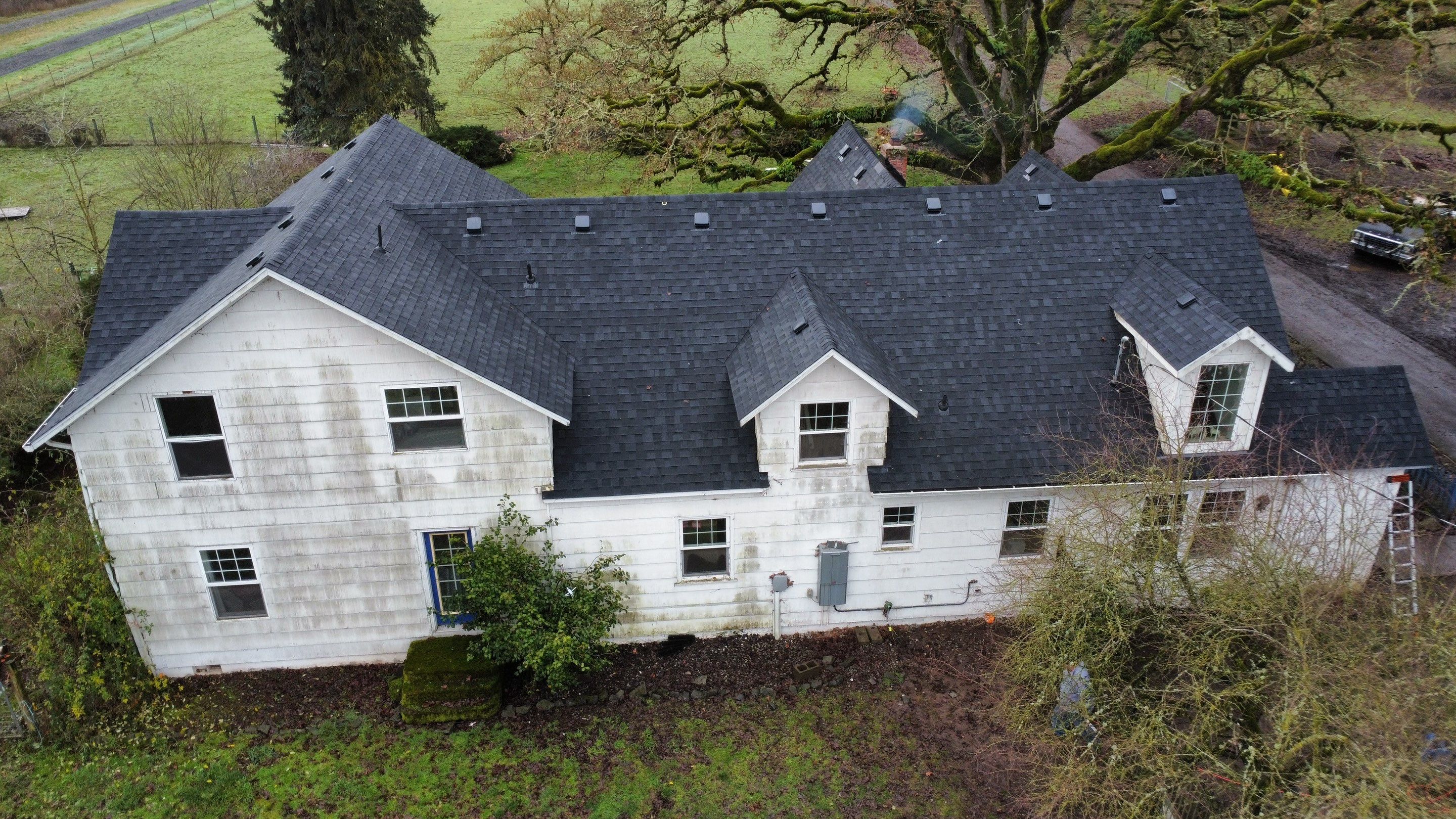 Residential Roofing Installation using IKO Dynasty (Color: Granite Black) by Orezona Building & Roofing Company, Inc.