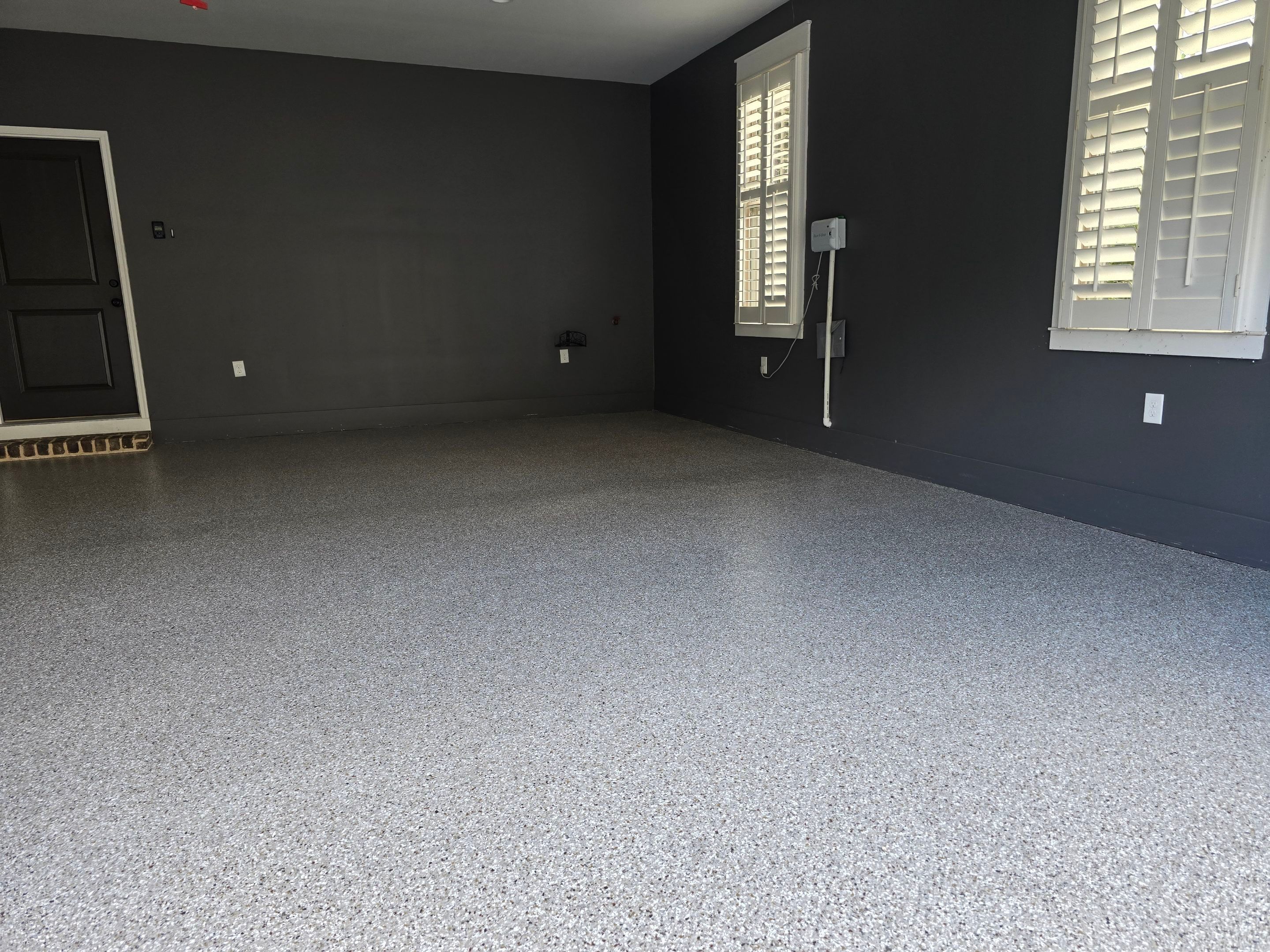 Garage & Porch Using Creekbed & Shoreline by Elite Floor Solutions