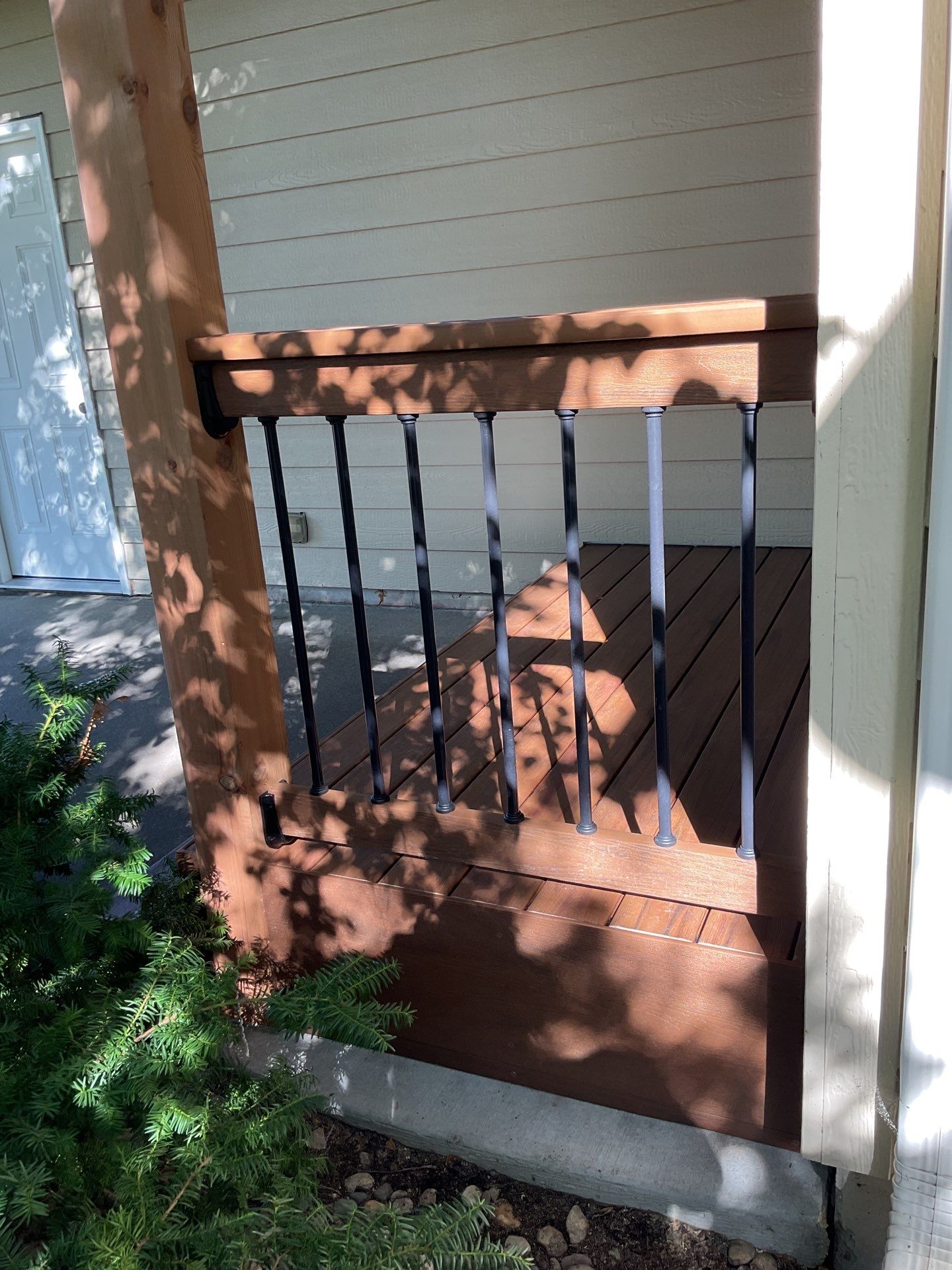 Sioux Falls Exterior Siding Replacement and Custom Deck Upgrade by Select Painting, Coatings & Garage Cabinets
