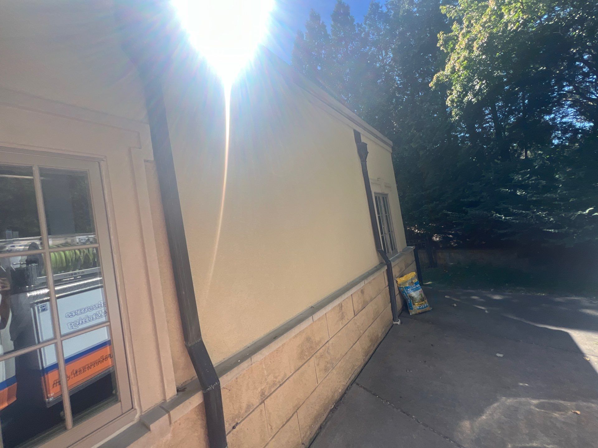 concrete cleaning using Algaecide, soft wash soap by Northern Power Washing LLC.