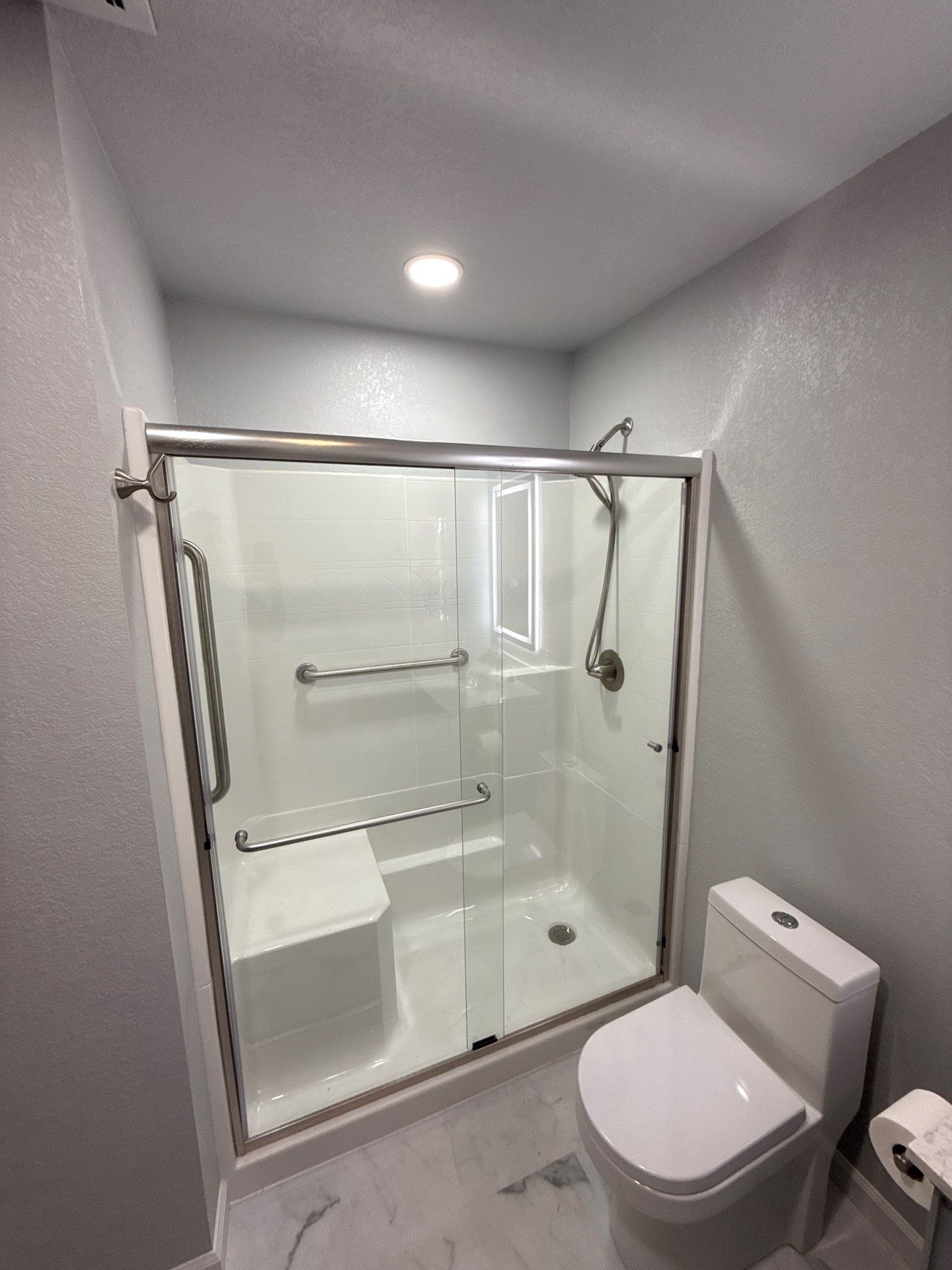 Bathroom remodel by In & Out Construction & Remodeling, LLC