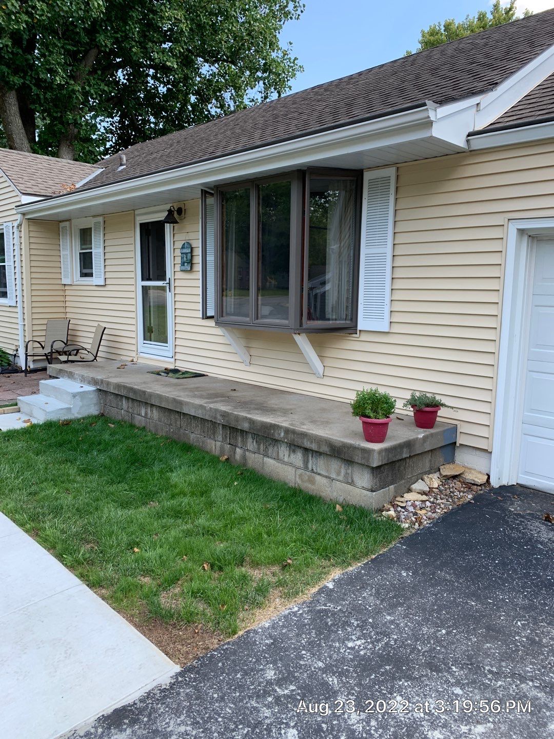 Window Installation with a Heartland Bay Window by EEC  Windows, Siding & Roofing 