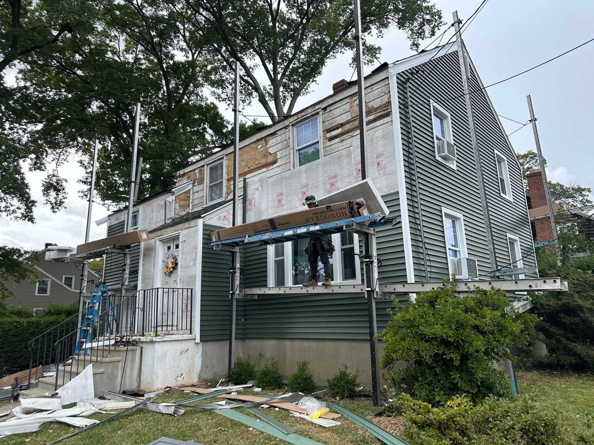 Siding Installation using CertainTeed Monogram Vinyl Siding - D4 - Forest by A Plus Exterior