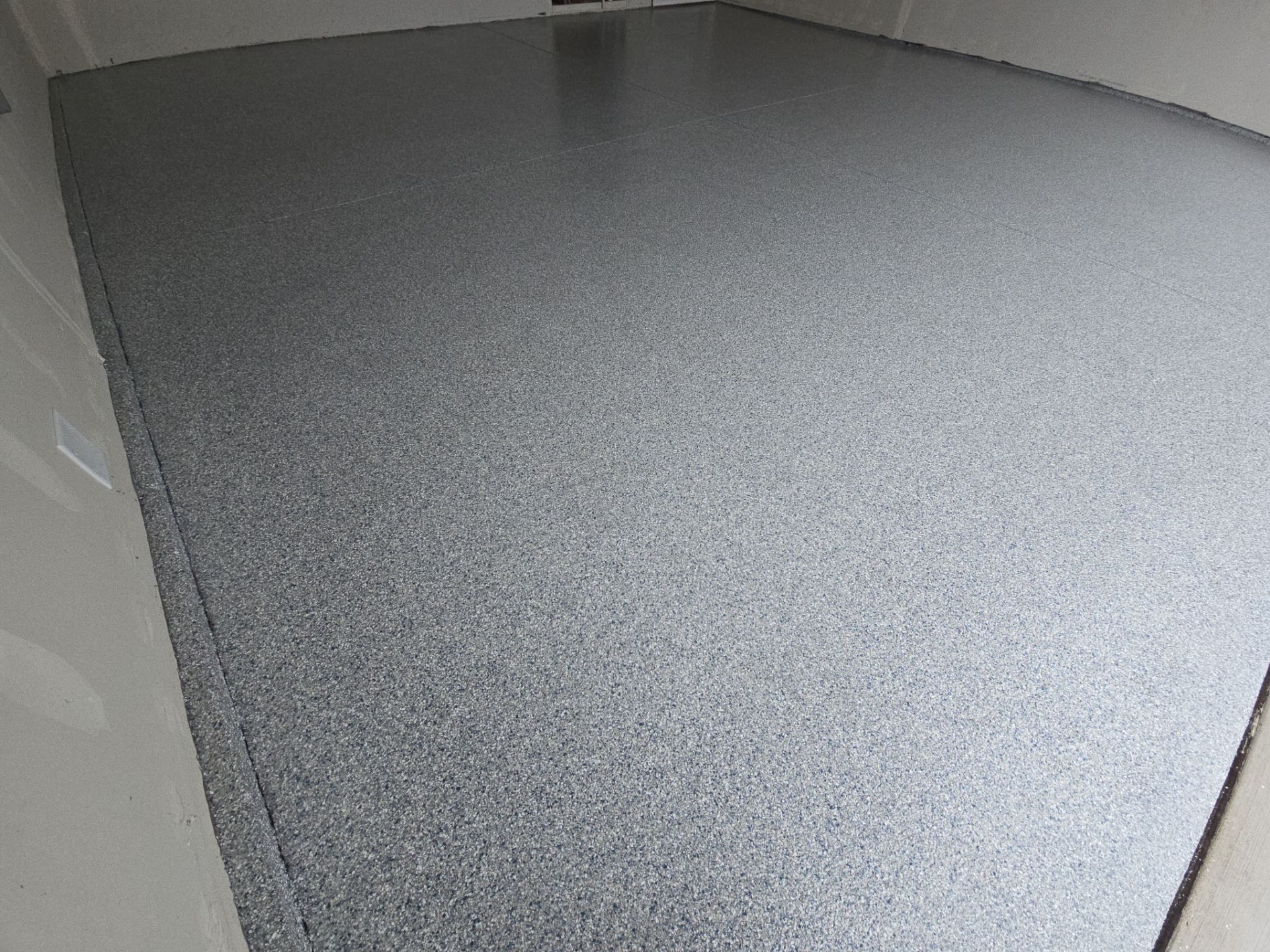 Garage Transformation using Trail Mix 1/8" Chip by Croc Coatings, LLC