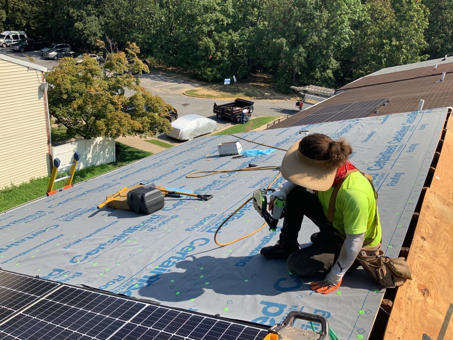 Residential Roofing Installation using Landmark Shingles Color Weatherwood by Alpha Design Services