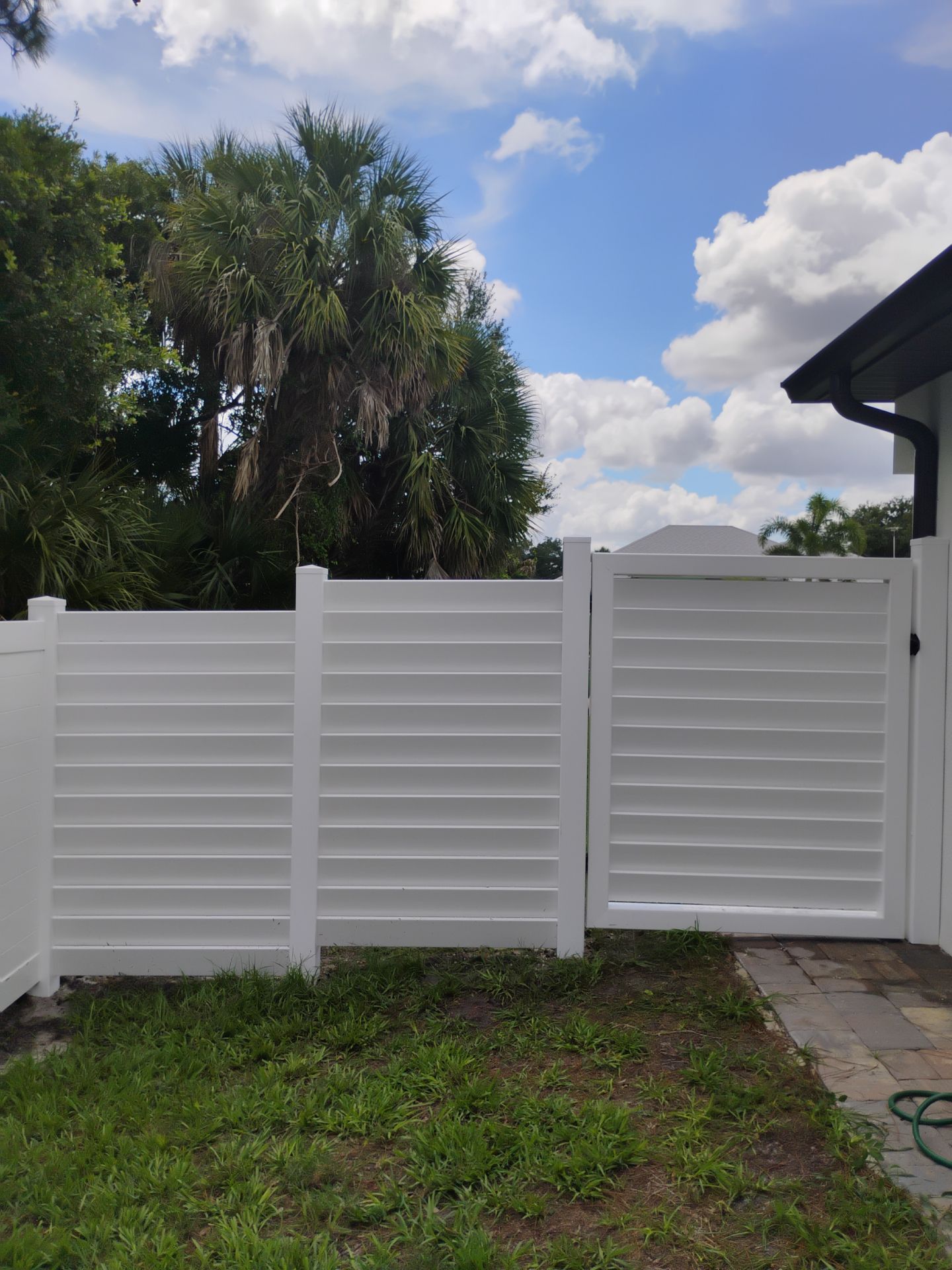 Horizontal Slat White Vinyl Privacy Fence and Gate Installation by True Fence LLC