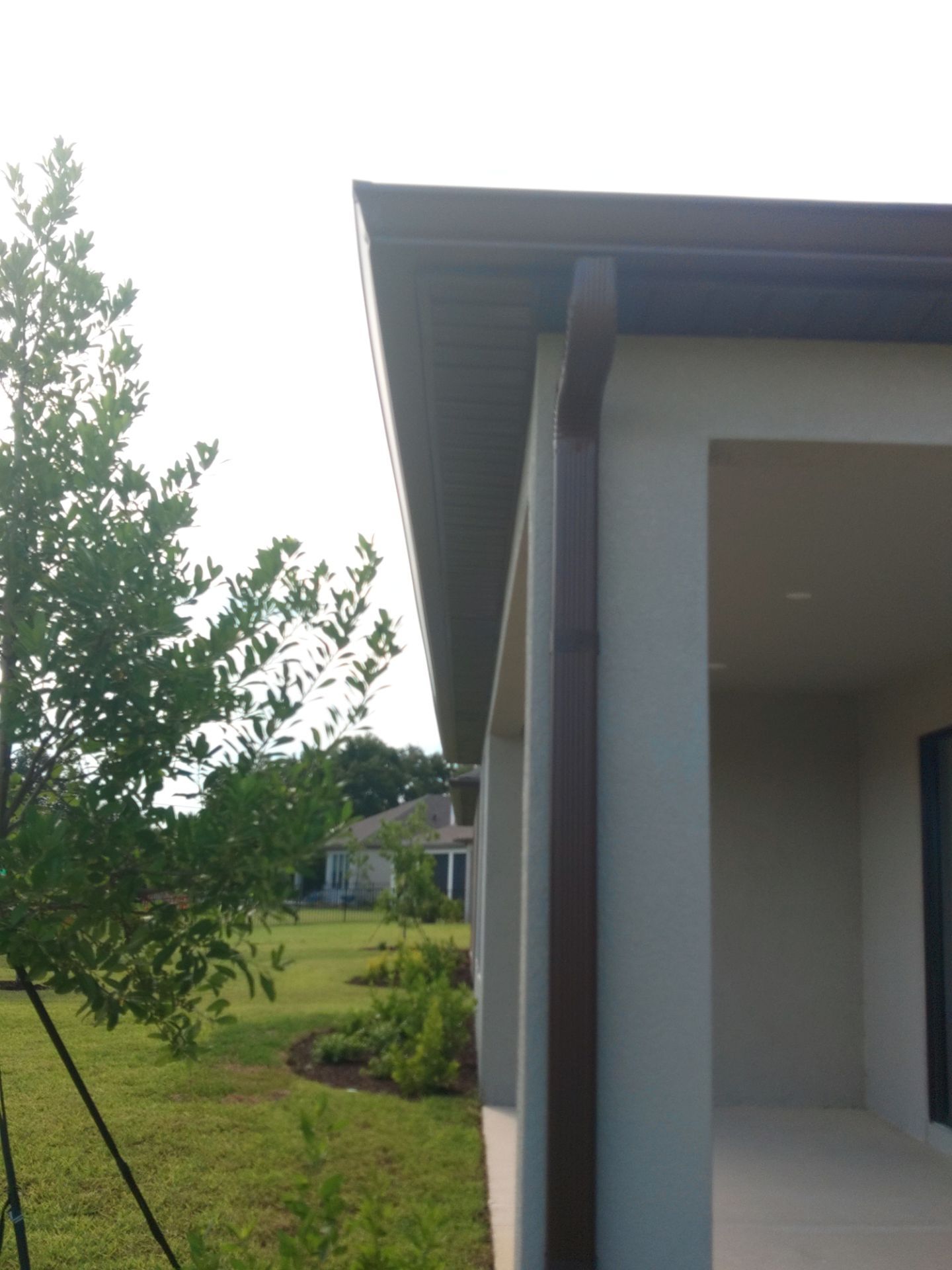 Musket Brown Seamless Gutters using Musket Brown Seamless Gutters in Nokomis FL by Gutter Professors
