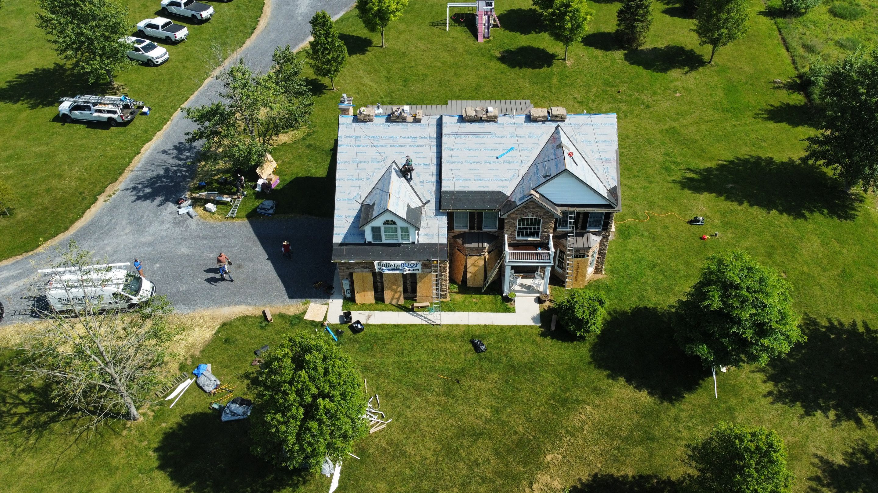 Roof Damage using Certainteed Lifetime Roofing System- Moire Black Landmark Pro shingkes with shadow ridge caps. by BulletpROOF Exteriors