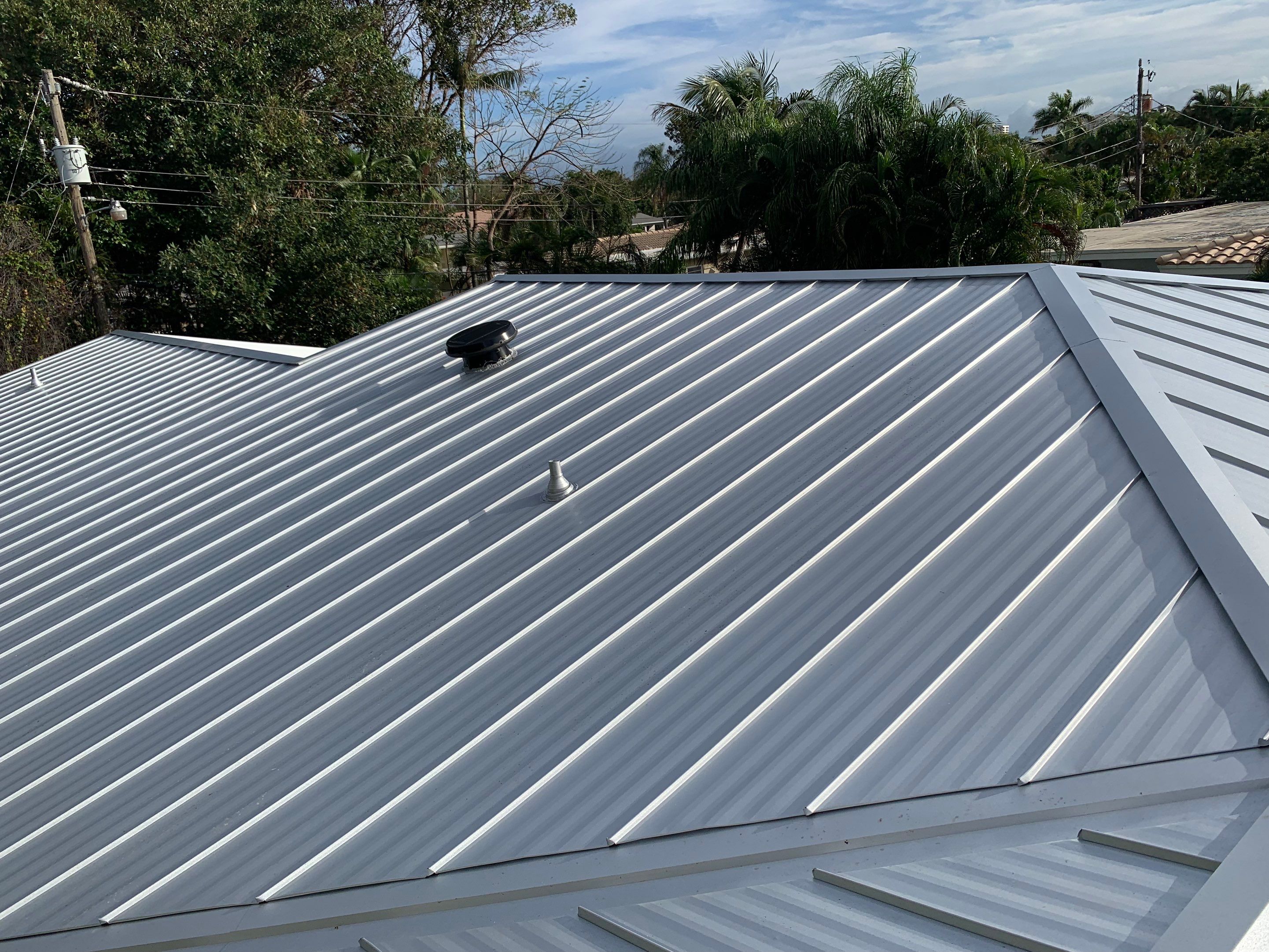 Residential Roofing Installation using 1" Nail strip metal roof by BLUES BROTHERS ROOFING