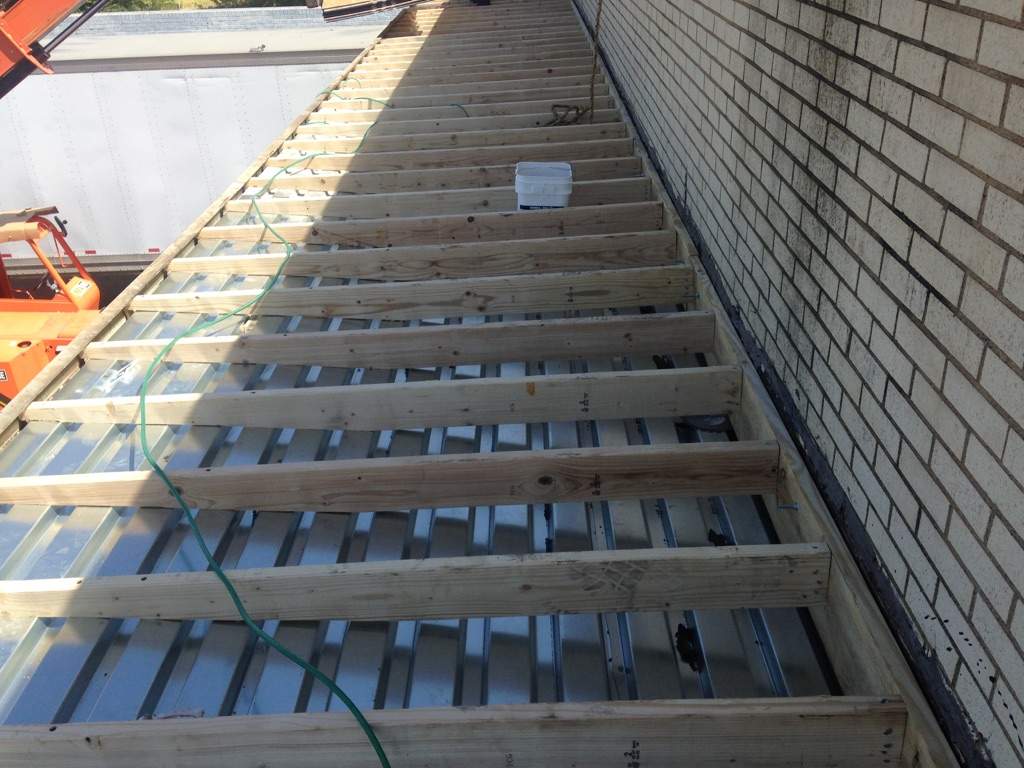 Massive Storm Damage Project - Factory in Arlington by First United Roofing & Construction