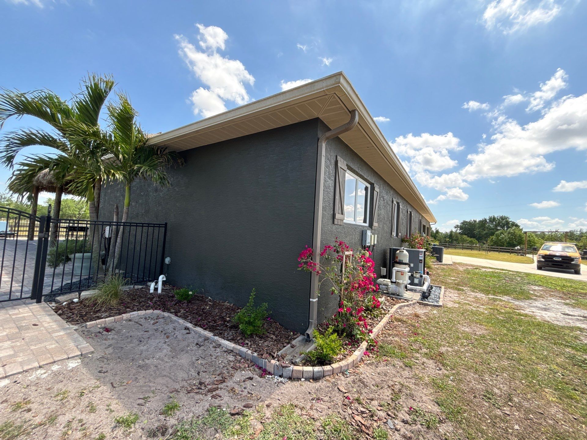  7-inch White seamless gutters and downspouts in Myakka City FL by Gutter Professors