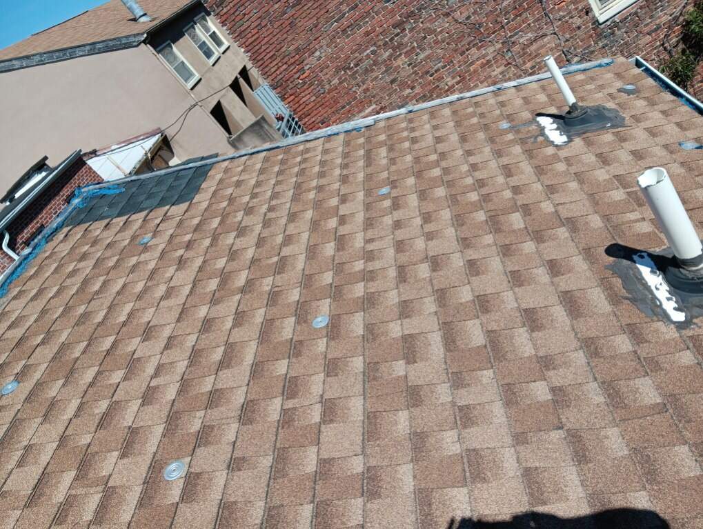 Residential Roofing Installation using Landmark Shingles by Alpha Design Services