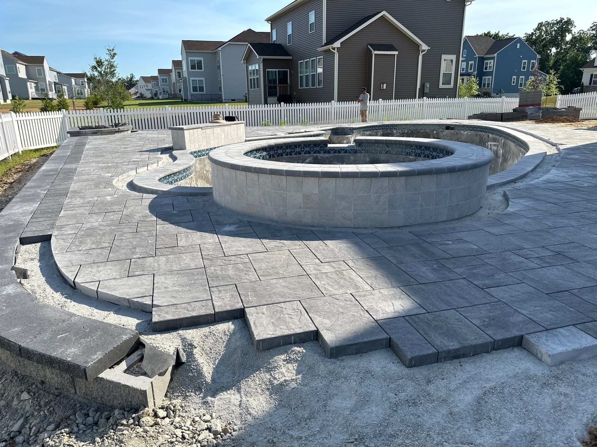 Pool and Hardscape Design in Delaware | Belgard Paver Patio & Outdoor Living Space by Studio G Indoor Spaces & Outdoor Living