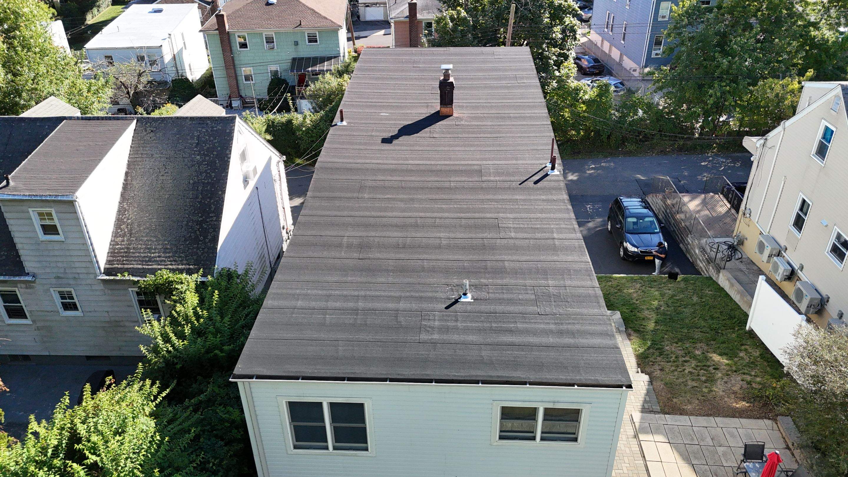 Project in Yonkers by The Energy Efficient Roofer & George's Seamless Gutters