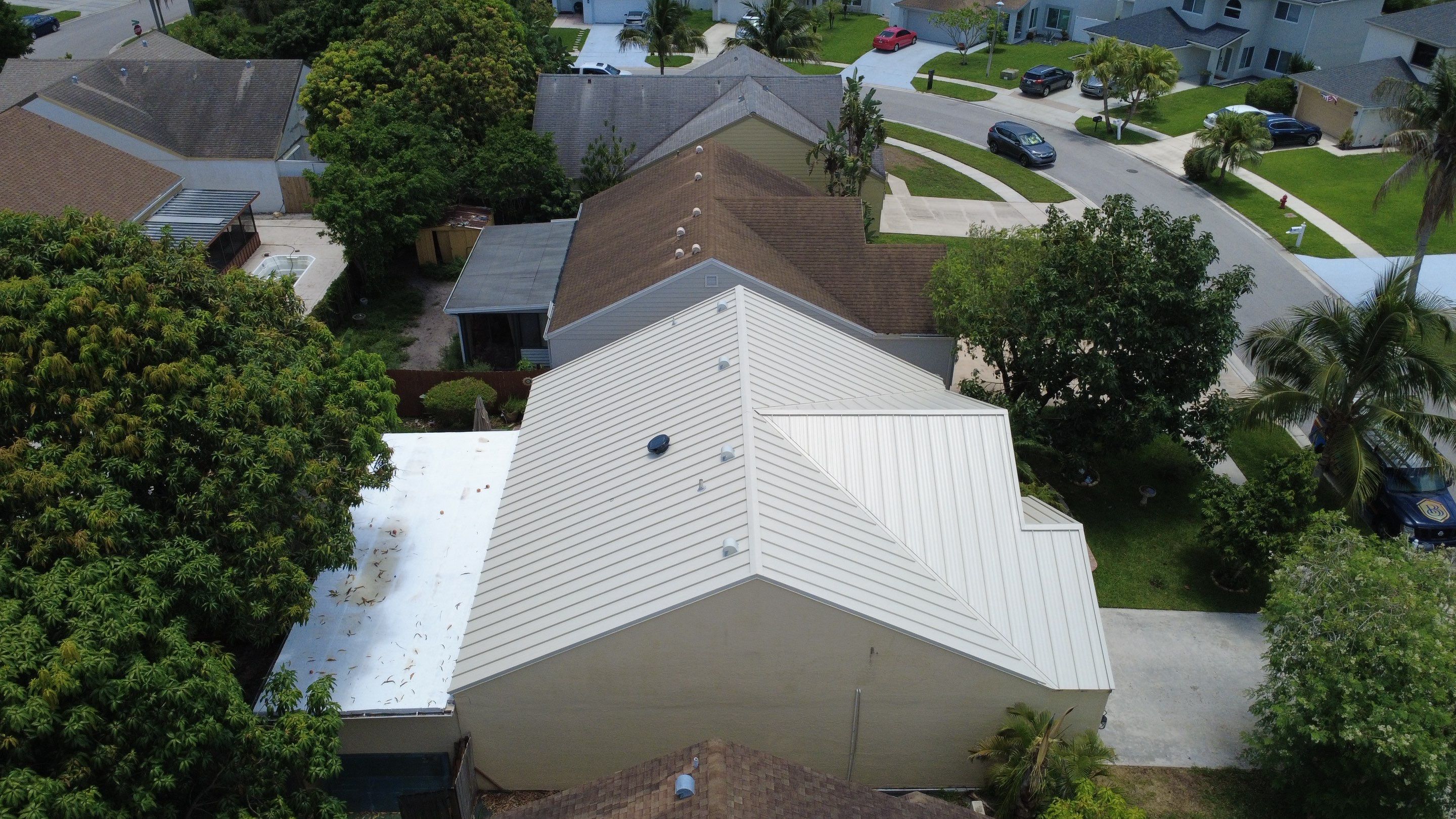 Residential Roofing Installation using 1.5'' Mechanical Seam by BLUES BROTHERS ROOFING