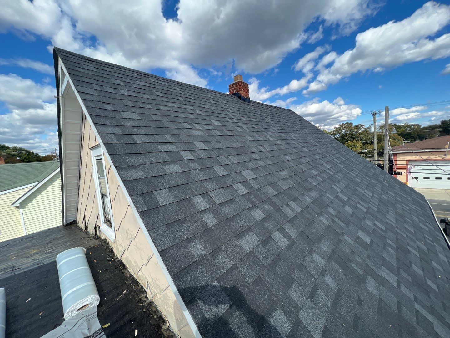 Onyx Black Shingles by Reimagine Roofing