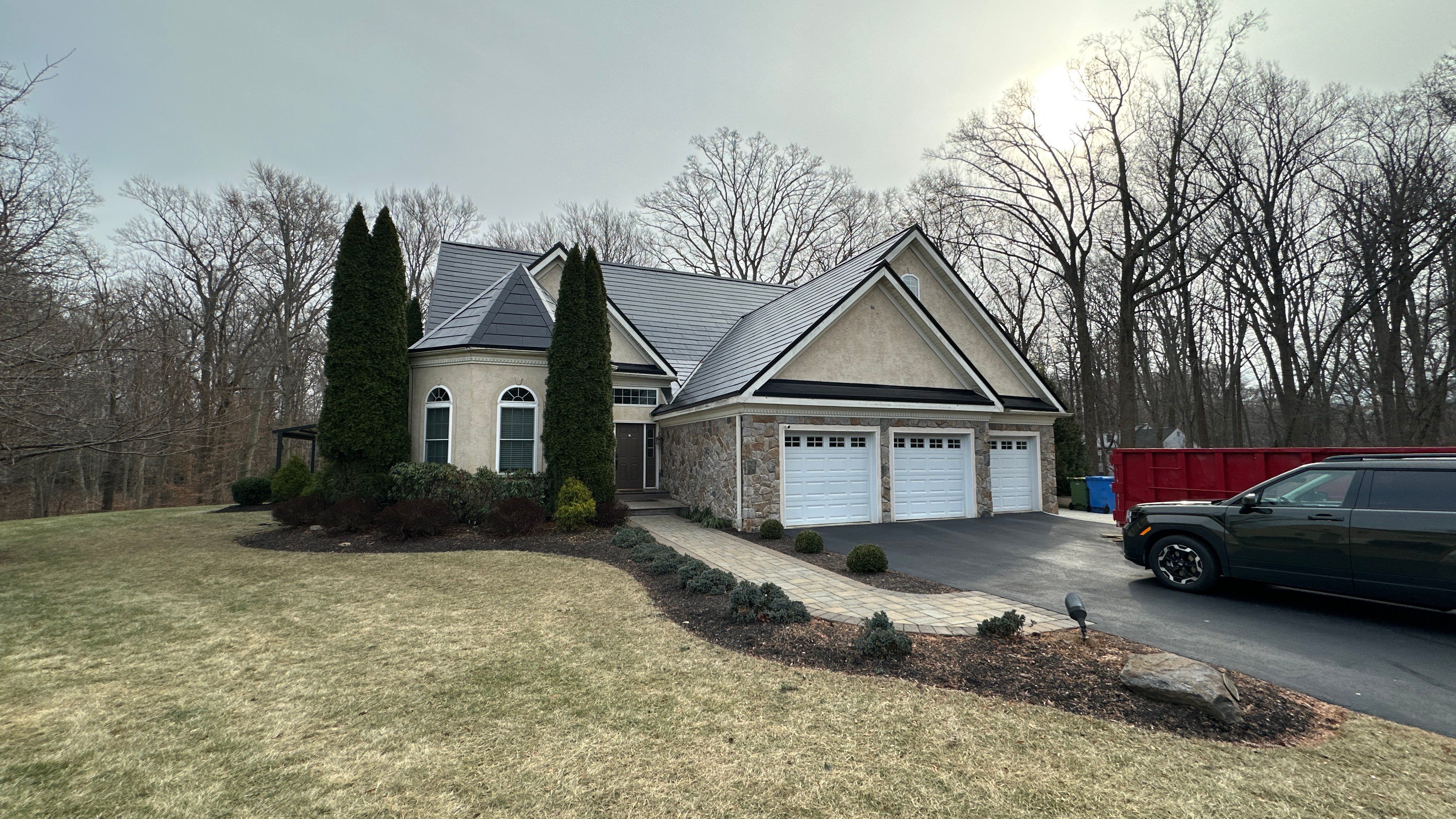 Tesla Solar Roof  using Tesla Powerwall by American Home Contractors