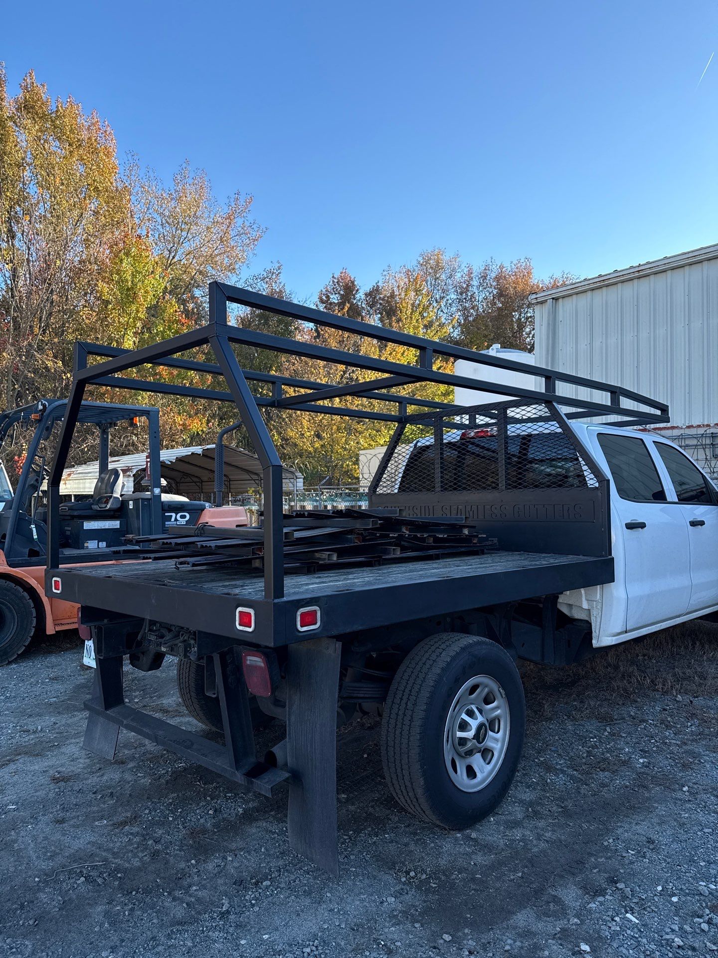Seamless Gutters Ladder Rack by Gregory Sandstrom