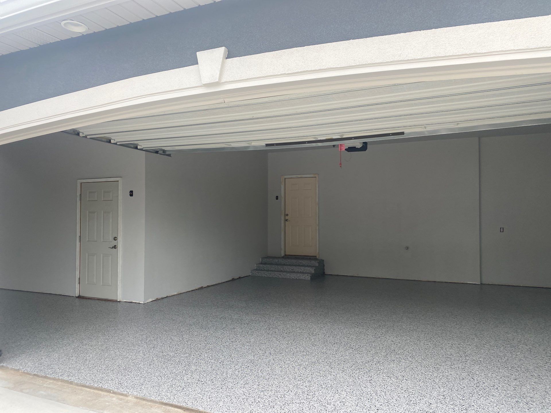 Dennis P. upgraded his garage and patio with a new flake floor by Banner Garage