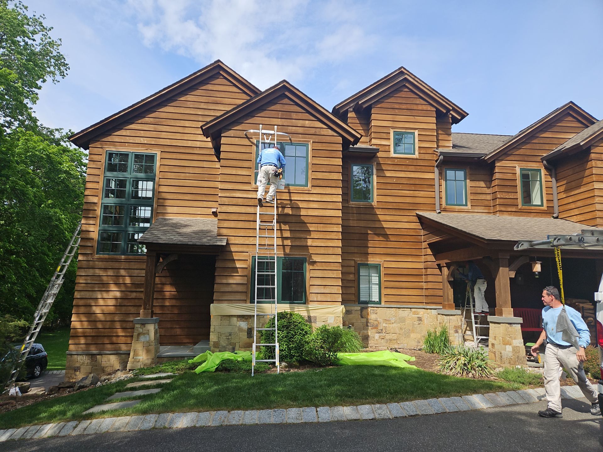 Exterior Powerwashing and Maintenance for a Teaneck Timber Home by Spectrum Painting, LLC