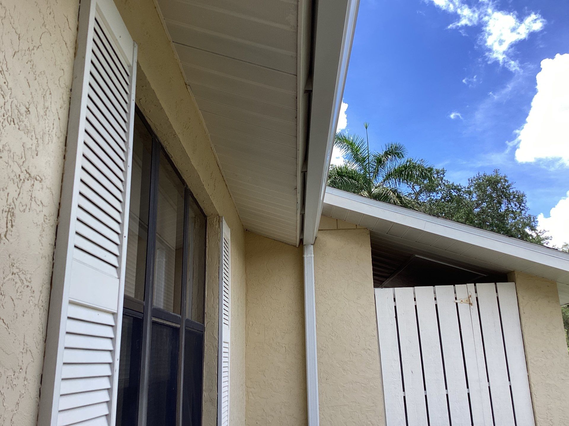 New Soffit and Fascia and White Gutters  by Gutter Professors