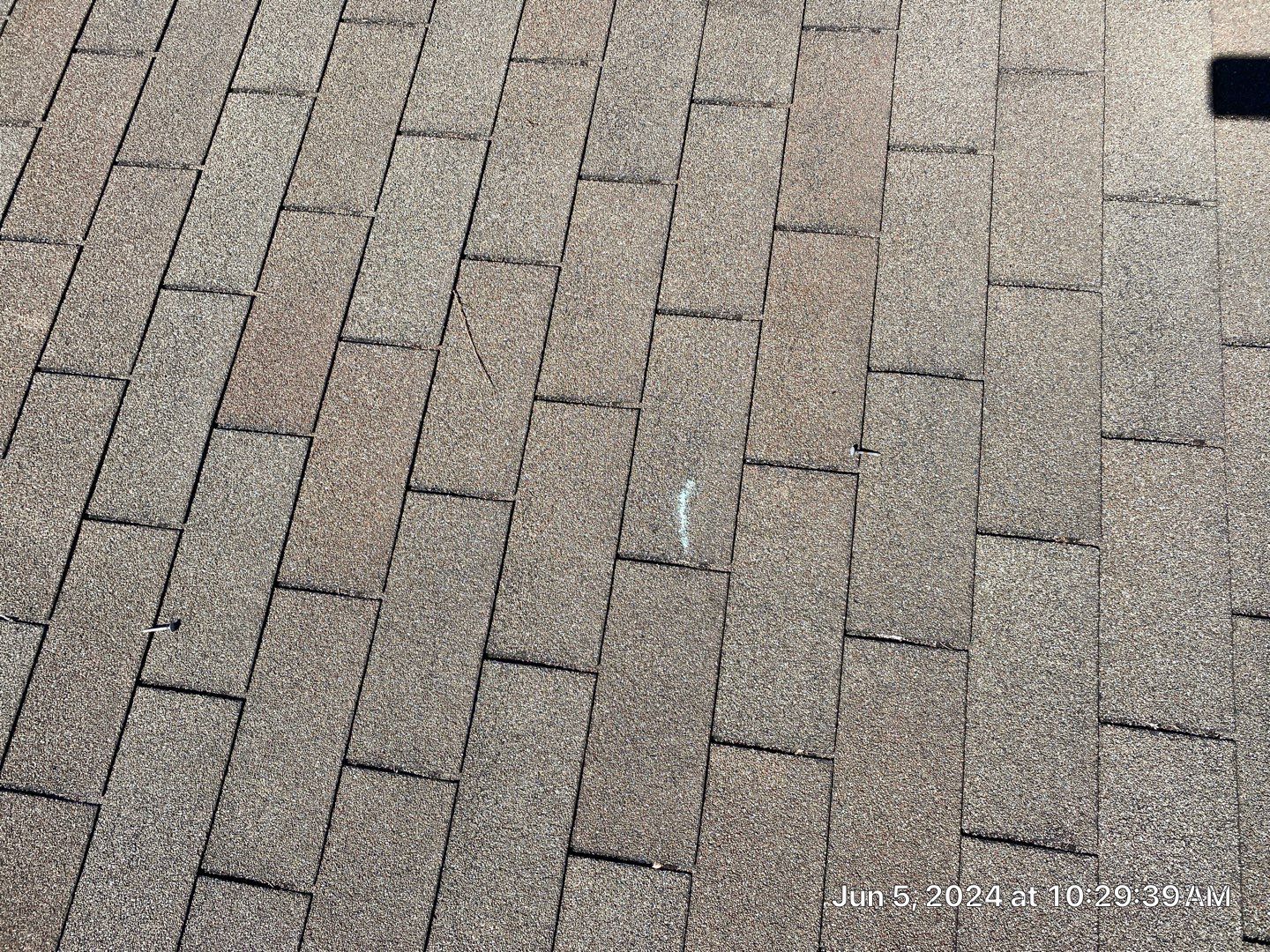 Roof inspection in Bartlesville by Decor Roofing & Restoration
