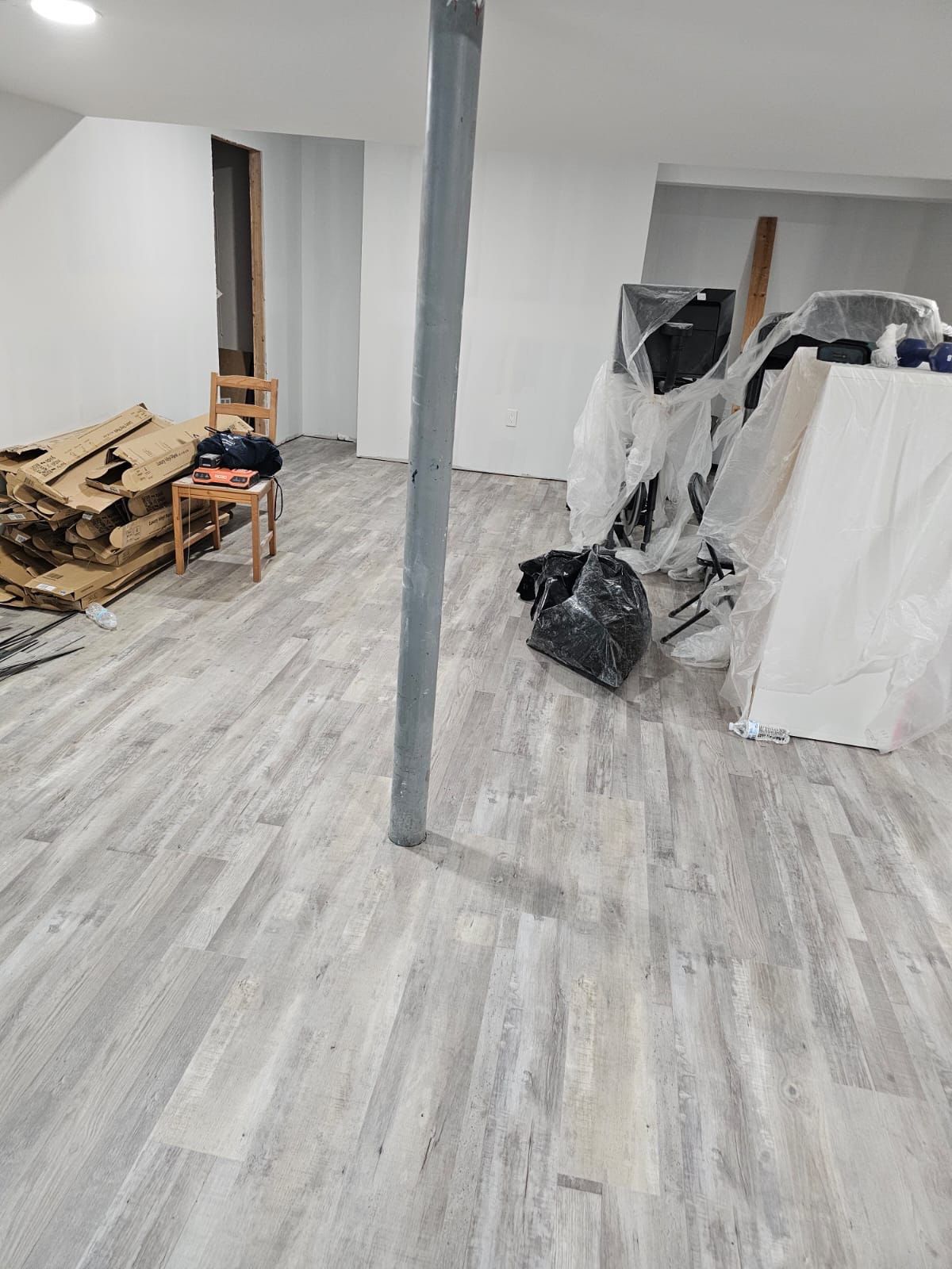 Basement Remodel using Wood by Home Concepts Construction