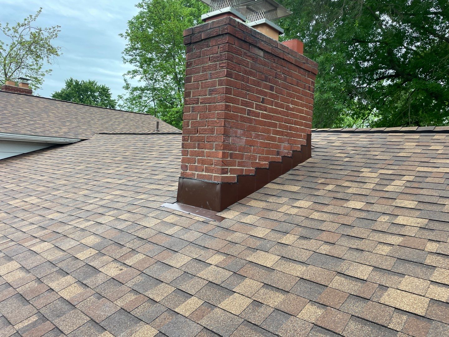 Roof Replacement - Owens Corning Dessert Rose by American Home Contractors