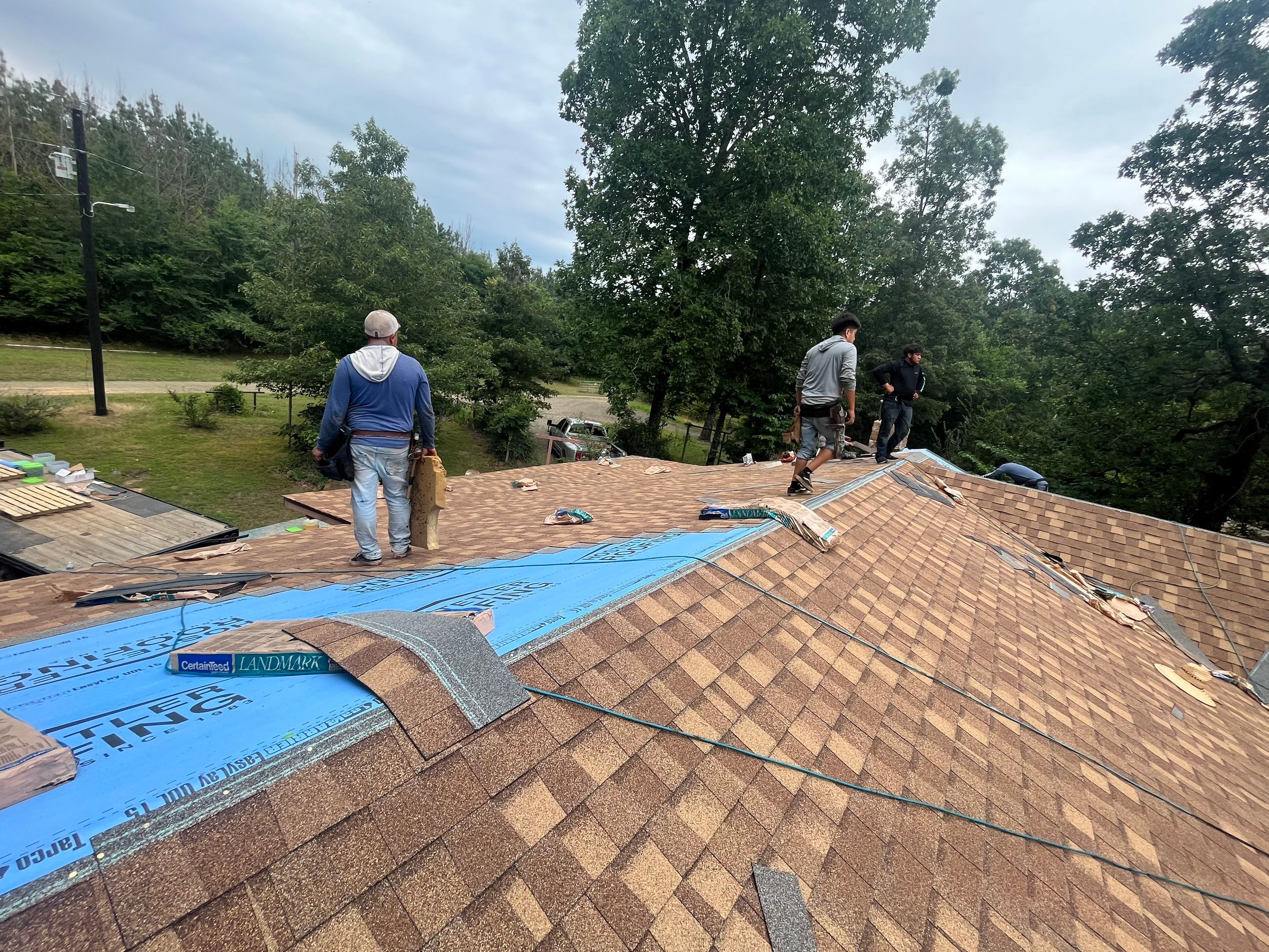 Storm Restoration Reroof: 25 Year 3-Tab Shingle by Hostetler Roofing