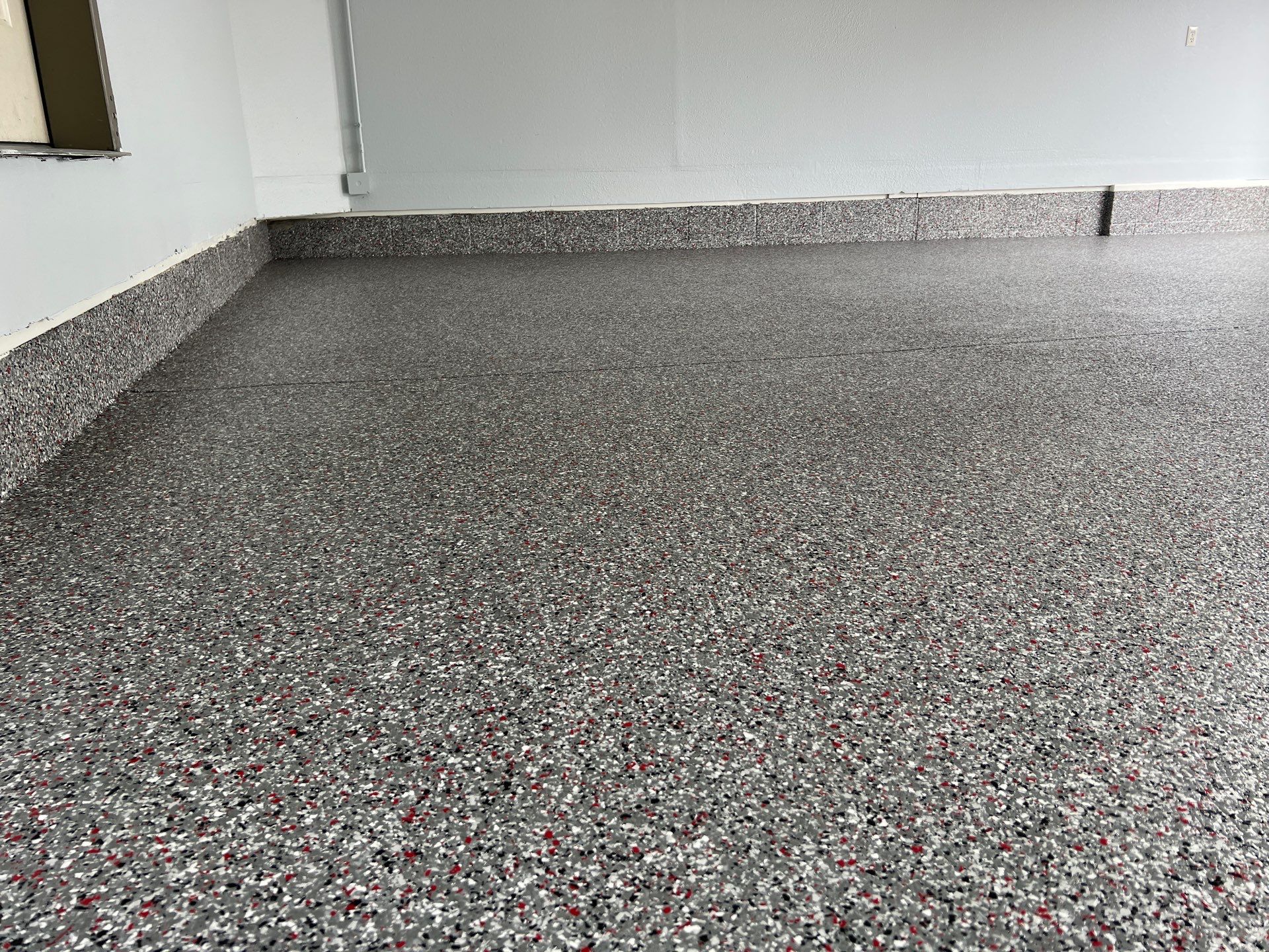 Crimson Storm Garage Coating  by NG Masonry & Construction LLC
