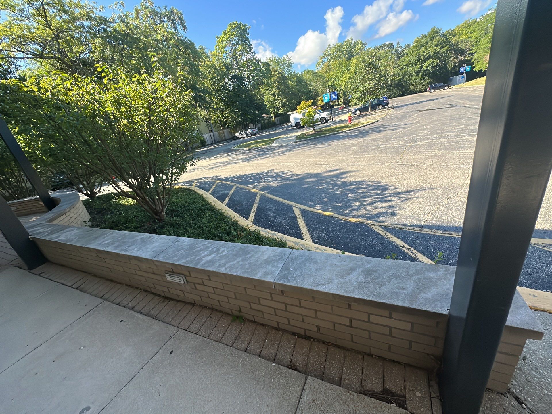 commercial pressure washing using Algaecide, soft wash soap by Northern Power Washing LLC.