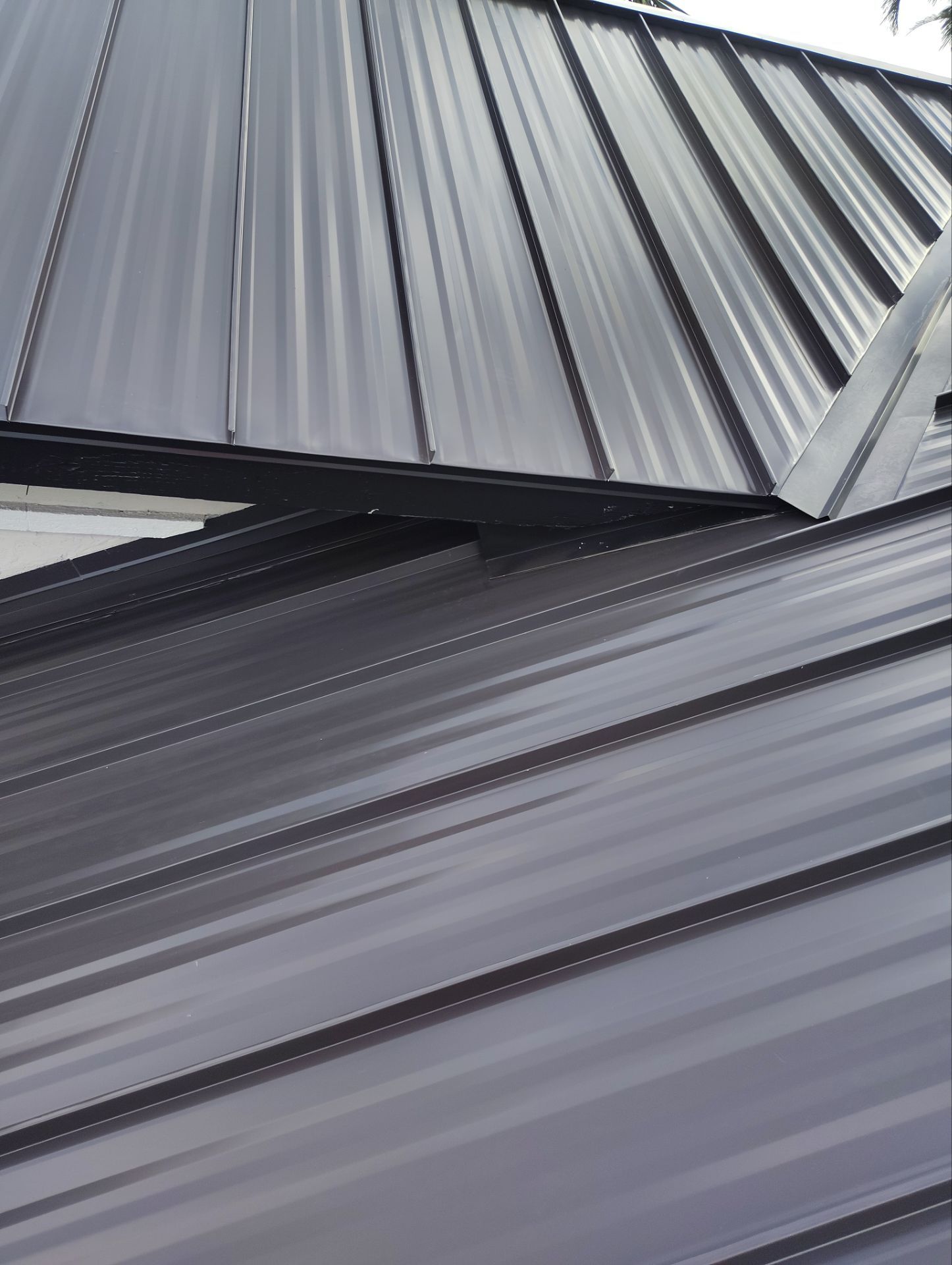 .032 Aluminum 1.5" Mechanical Seam Dark Bronze  by Total Roofing System The Metal Roof Experts